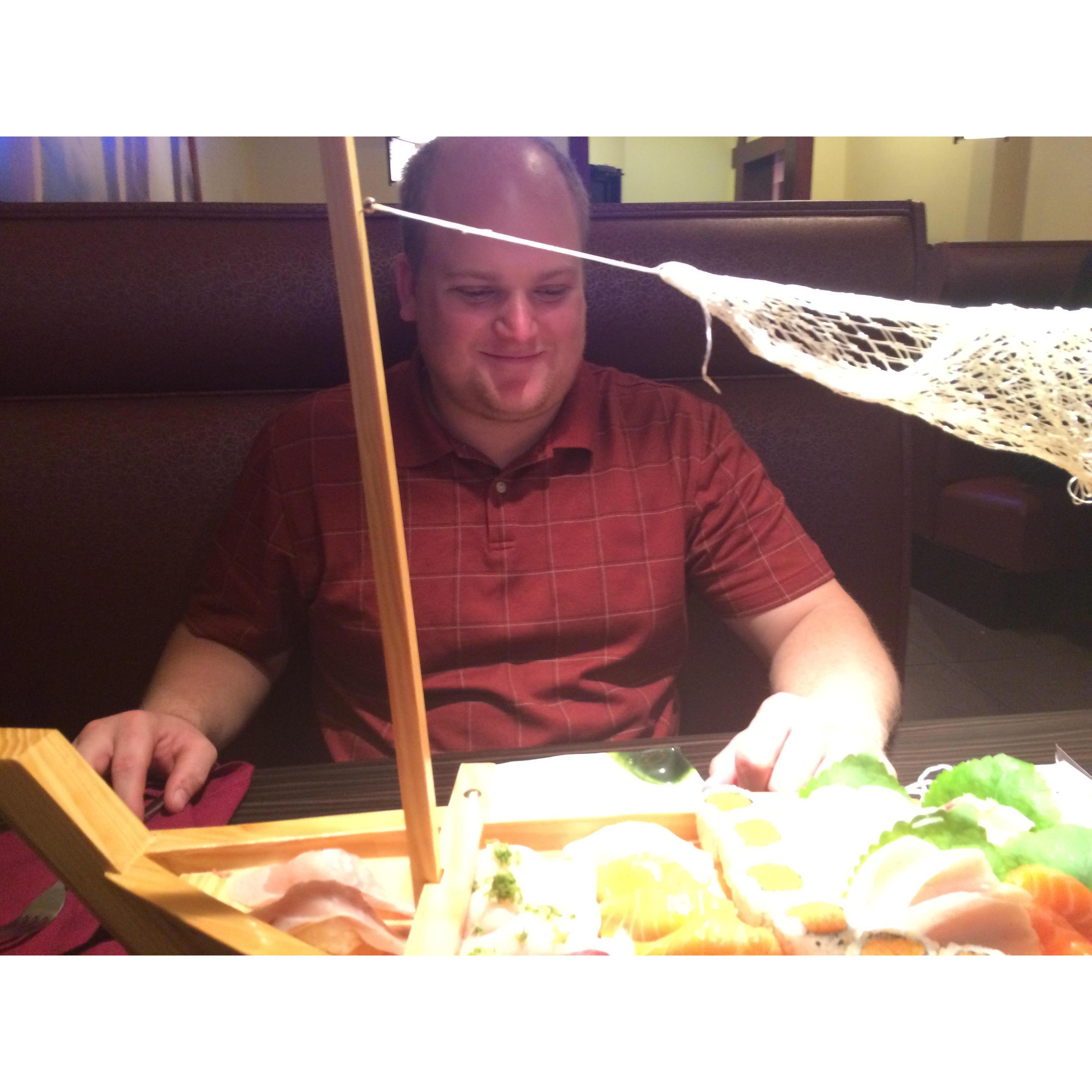 Jon's first time eating sushi.  Success!