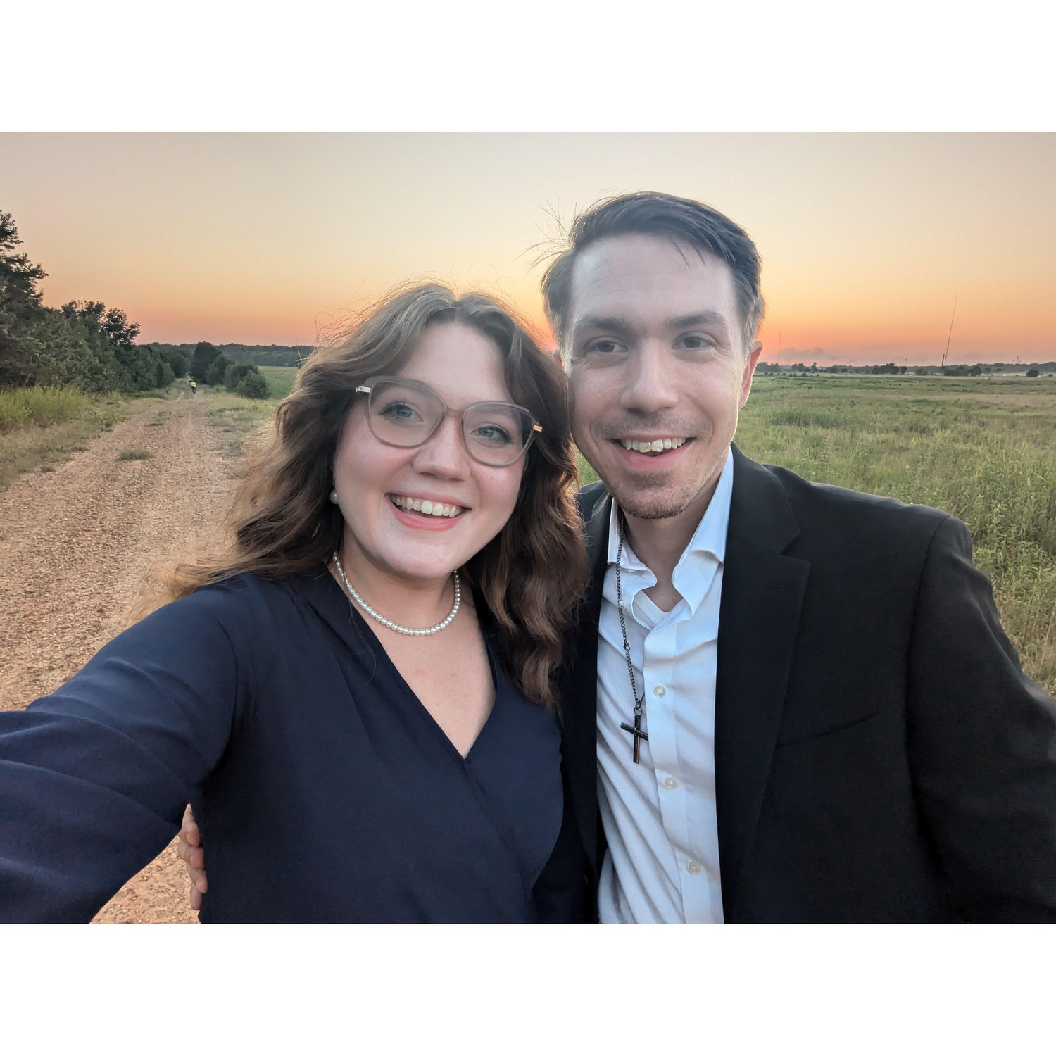 Slow dancing in a field as the sun set