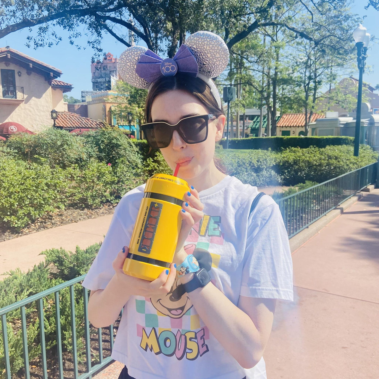 Margo taking a drink from a "scream can"