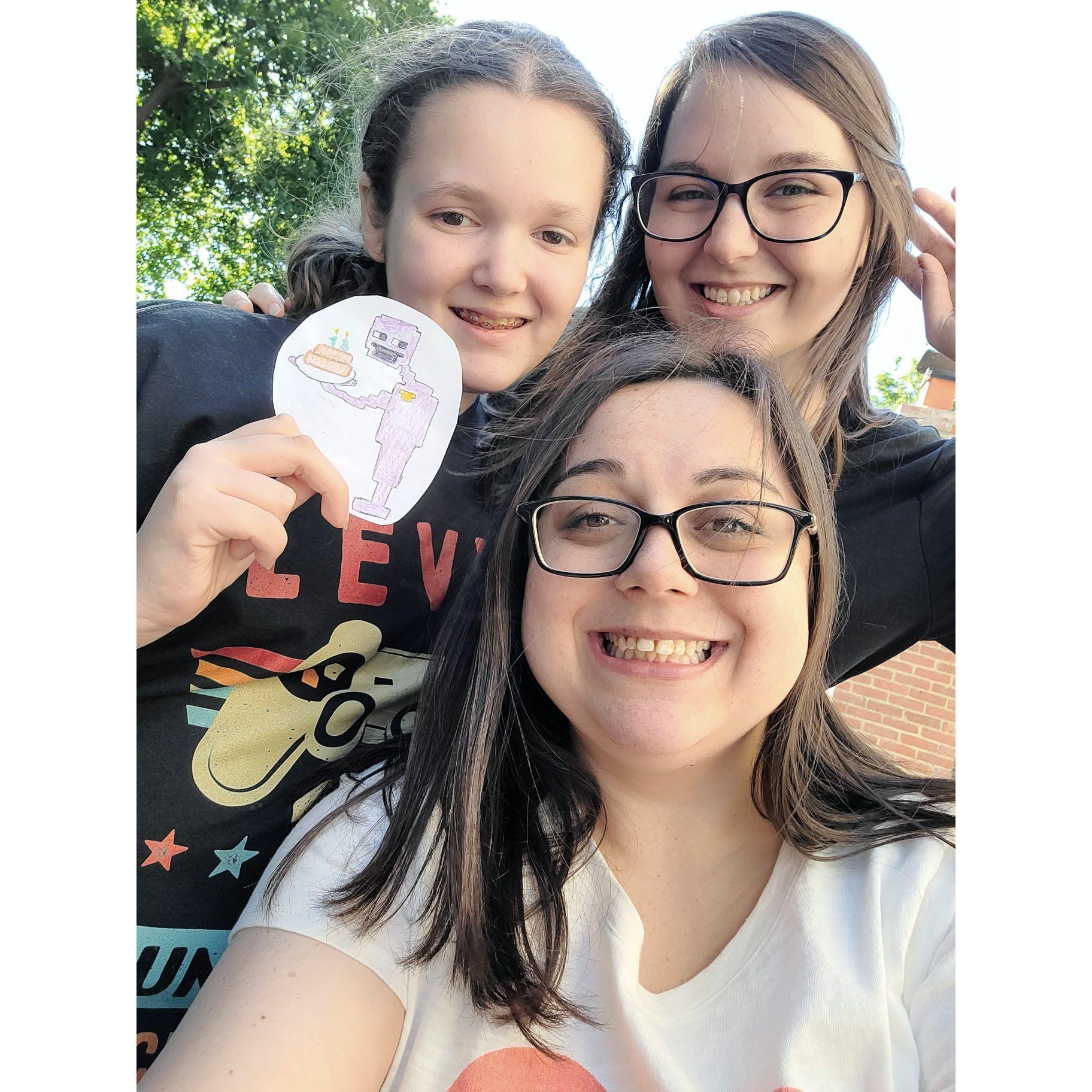 Our beautiful junior bridesmaid Gwen with her FNAF drawing of Purple Guy!