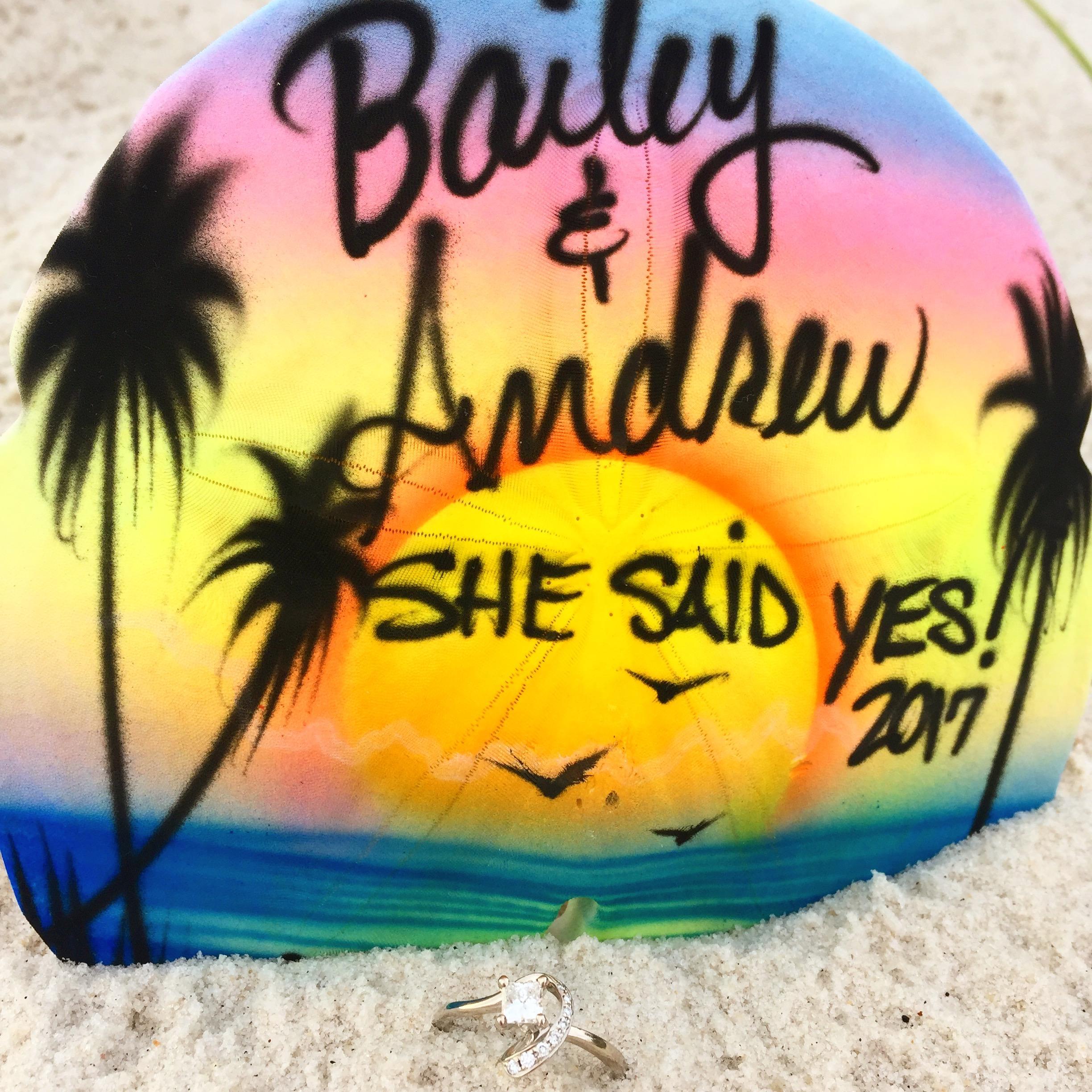 The ring and our memoir of the day set in sand