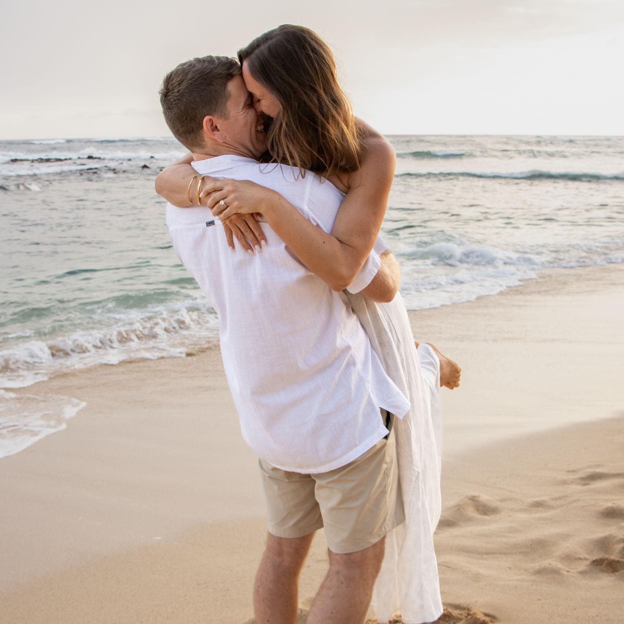 Right after he proposed, lifting someone up in the sand is harder than it looks fyi