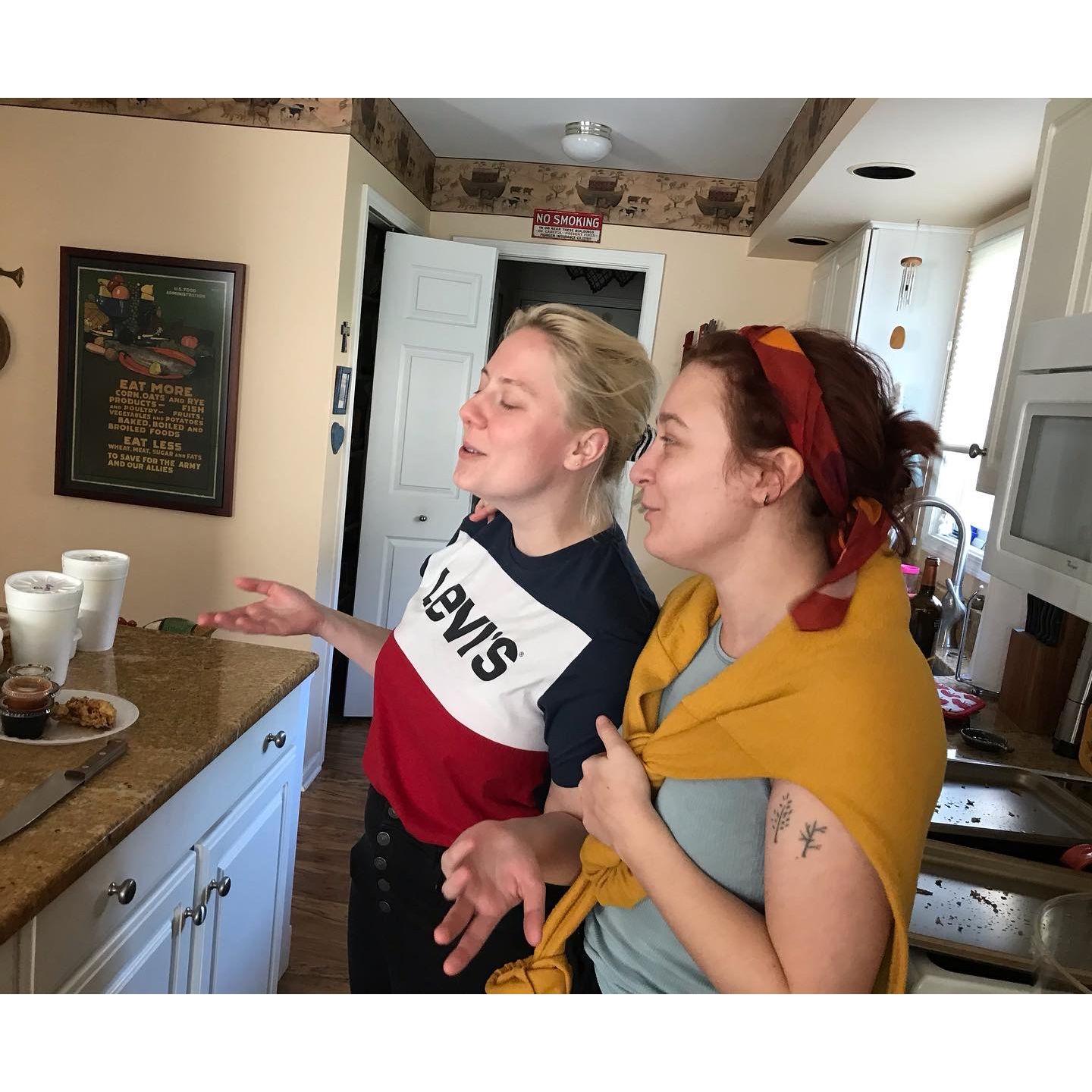 Not sure what's happening here. Sam is probably patronizingly describing a complicated cooking process while Nora patiently listens.