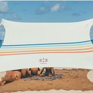 Neso Portable Beach Tent Sun Shelter with Sand Anchor - Lightweight Beach Shade Canopy - Easy Setup for Family Outings - Patented Reinforced Corners - UPF 50+ Sun Protection - 7 x 7ft - Rainbow