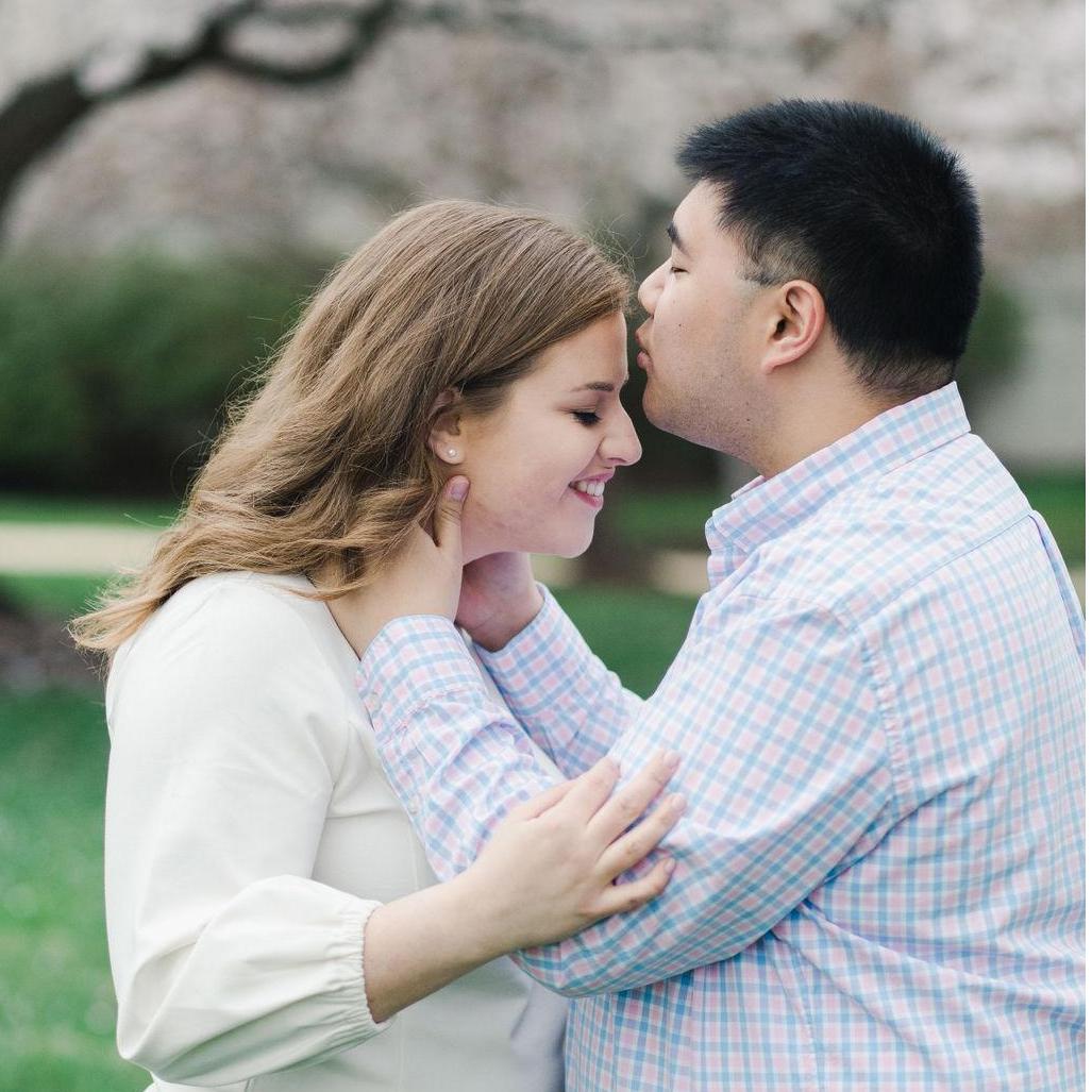 Cherry blossom engagement pictures at the Basilica of the National Shrine of the Immaculate Conception, March 2020. (Kate Grace Photography)