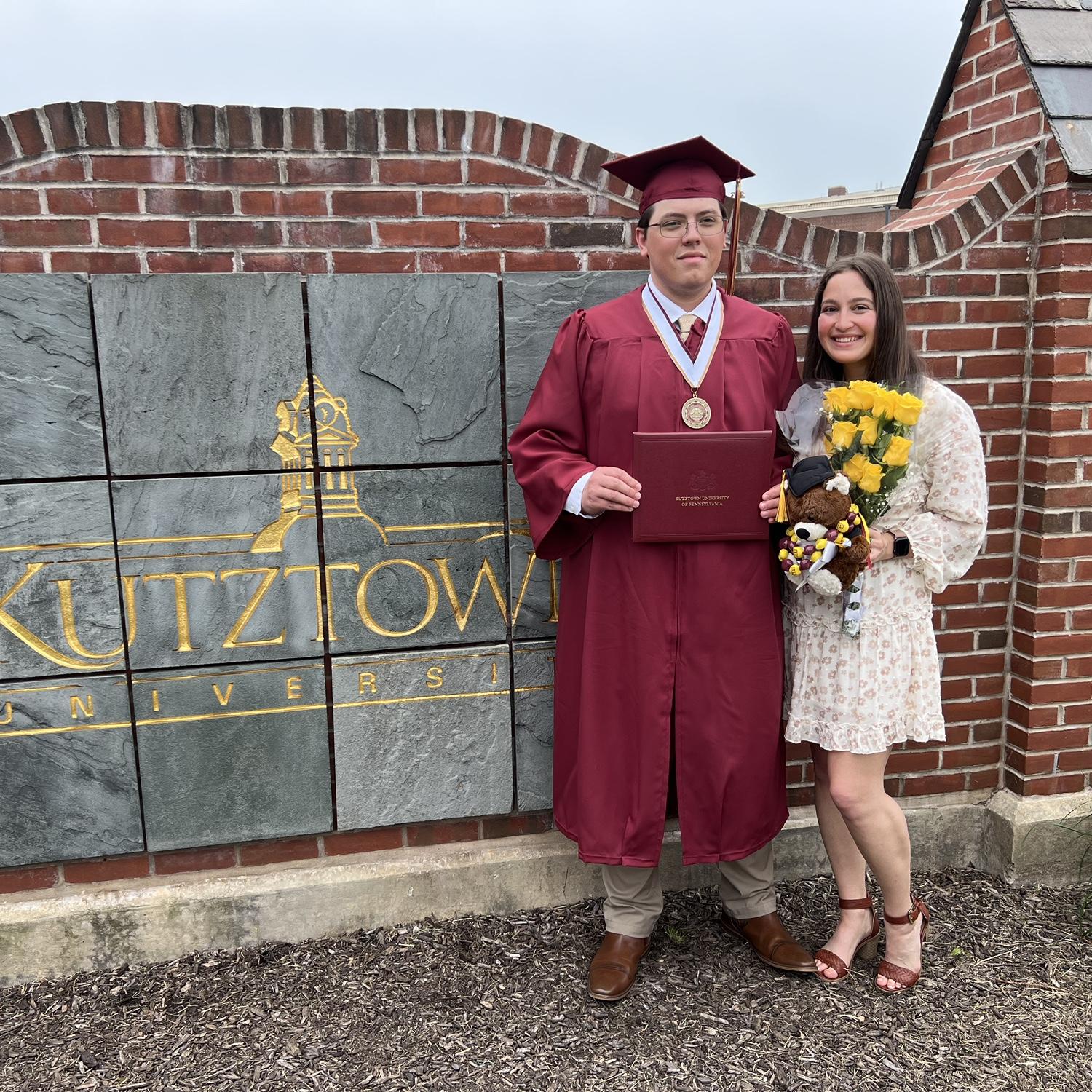 College graduation for Chris with his Bachelor of Science in Information Technology in 2023