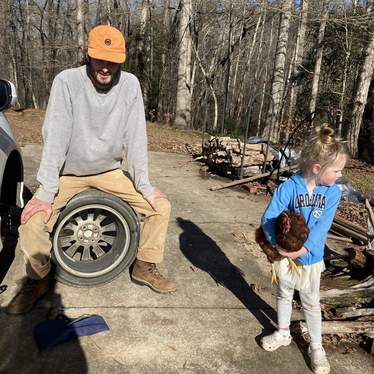 Libby and Tom fixed Micah’s flat tire.