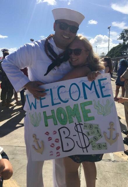 Coming home after a 9-month deployment and she did not want to let go any time soon! Also, "B-money" was the random nickname her friends gave me and it stuck!