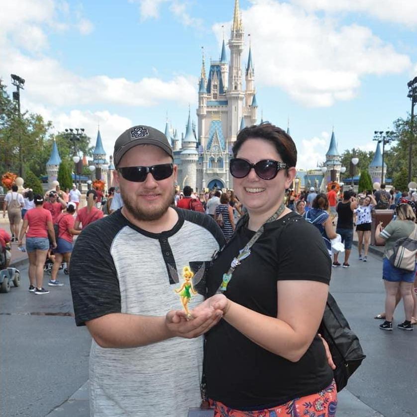 This was from the magical Disney trip we took where Chris finally popped the question. We definitely had to get a castle picture taken of us. Tinker Bell was just an added bonus.