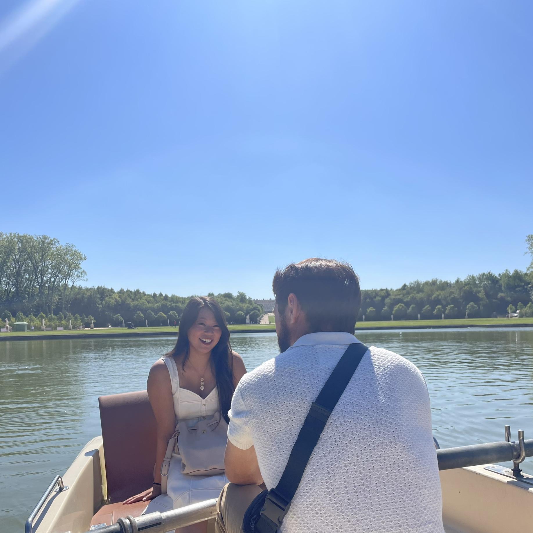 The Palace of Versailles, just outside Paris — where Trent rowed them gently across the grand canal as they captured some of their favorite engagement photos amidst timeless beauty.