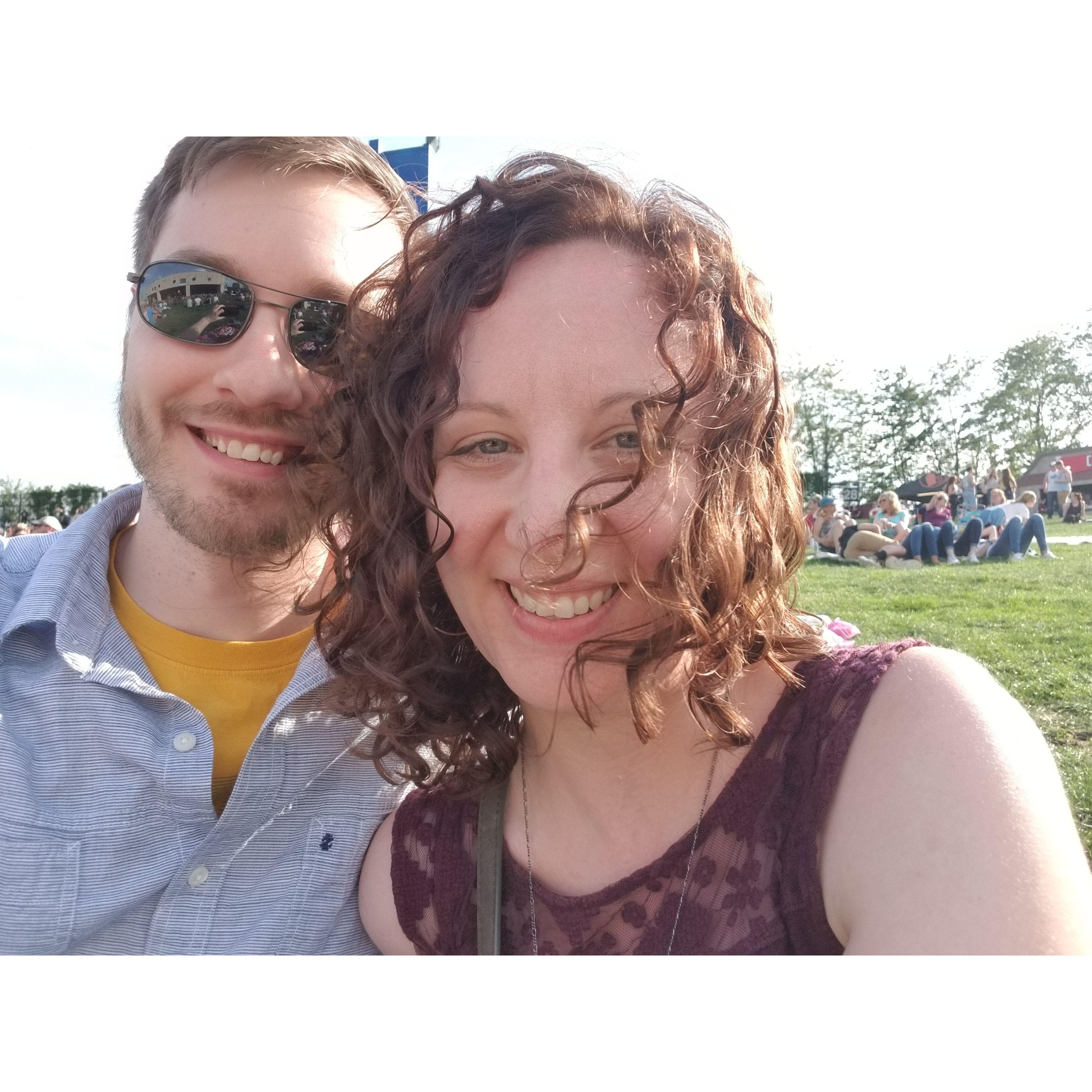 Enjoying a concert out on the lawn together
