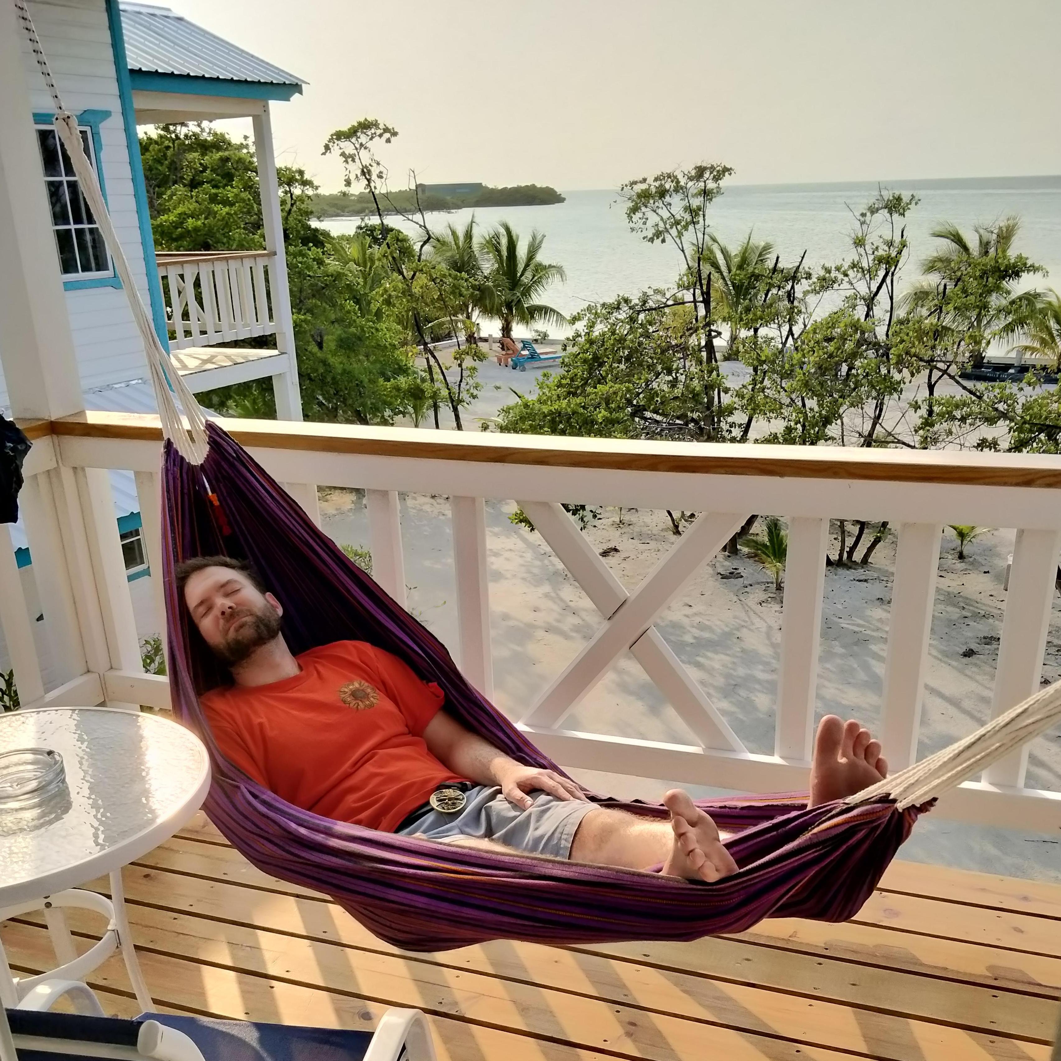 Lazy afternoon nap in a hammock in Caye Caulker, Belize.