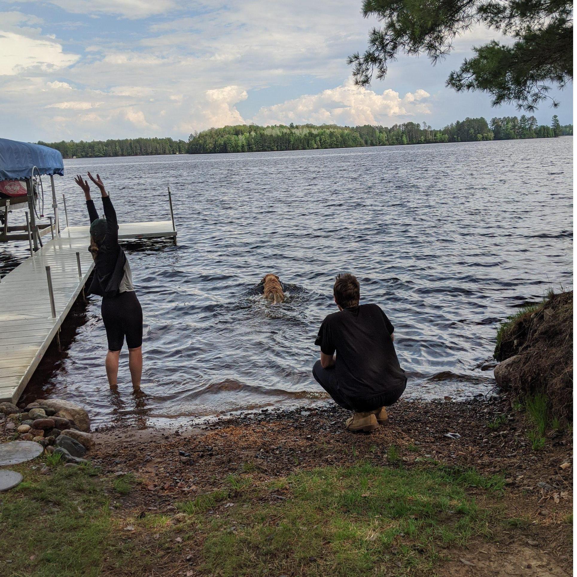 Tuck's first time swimming in Three Lakes, Wisconsin. Now, it's tough for us to keep him out of the water!
