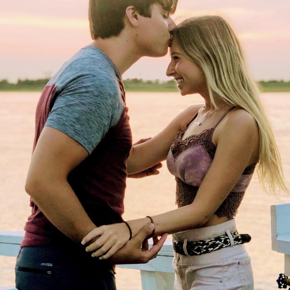 With pictures in frames of kisses on cheeks.
