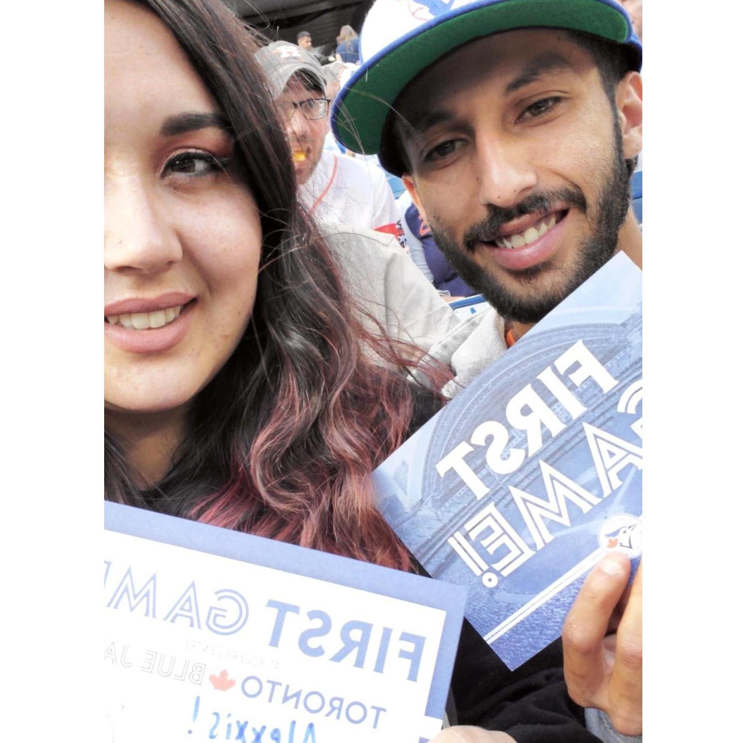 Toronto baseball game, about and hour before Chris proposed!