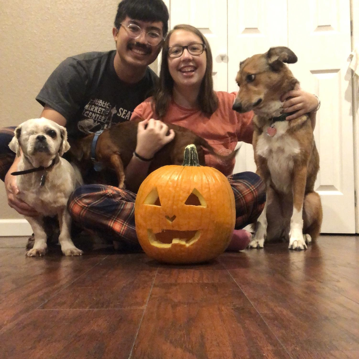 Michael and Naomi's first Halloween together in 2021! We were dog/house sitting for Naomi's mom, and Michael carved his first pumpkin!