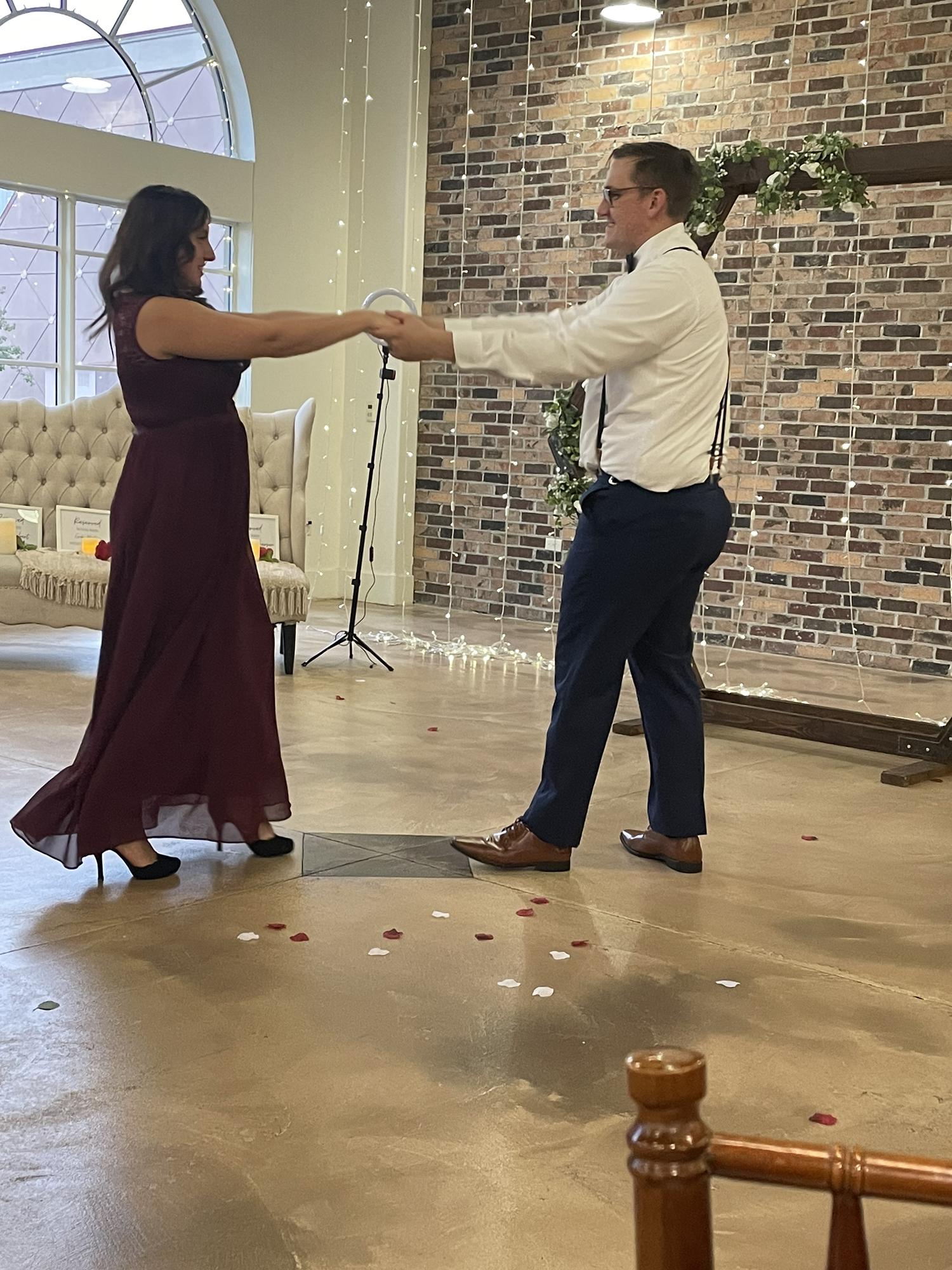 John let’s Caprice practice dance moves with him