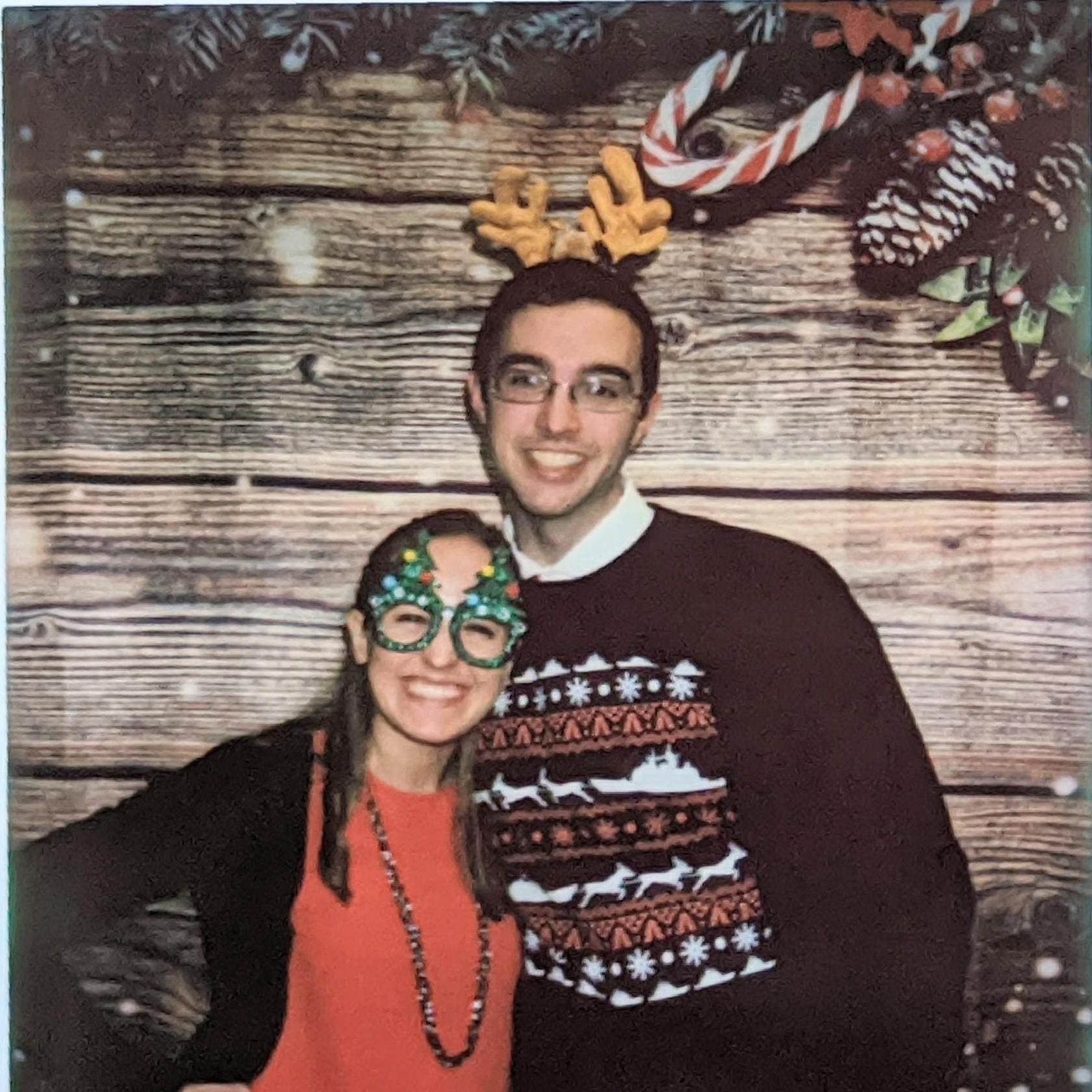 Polaroid from my command holiday party. Jessica flashing the famous smile while I rock the antlers. - Will