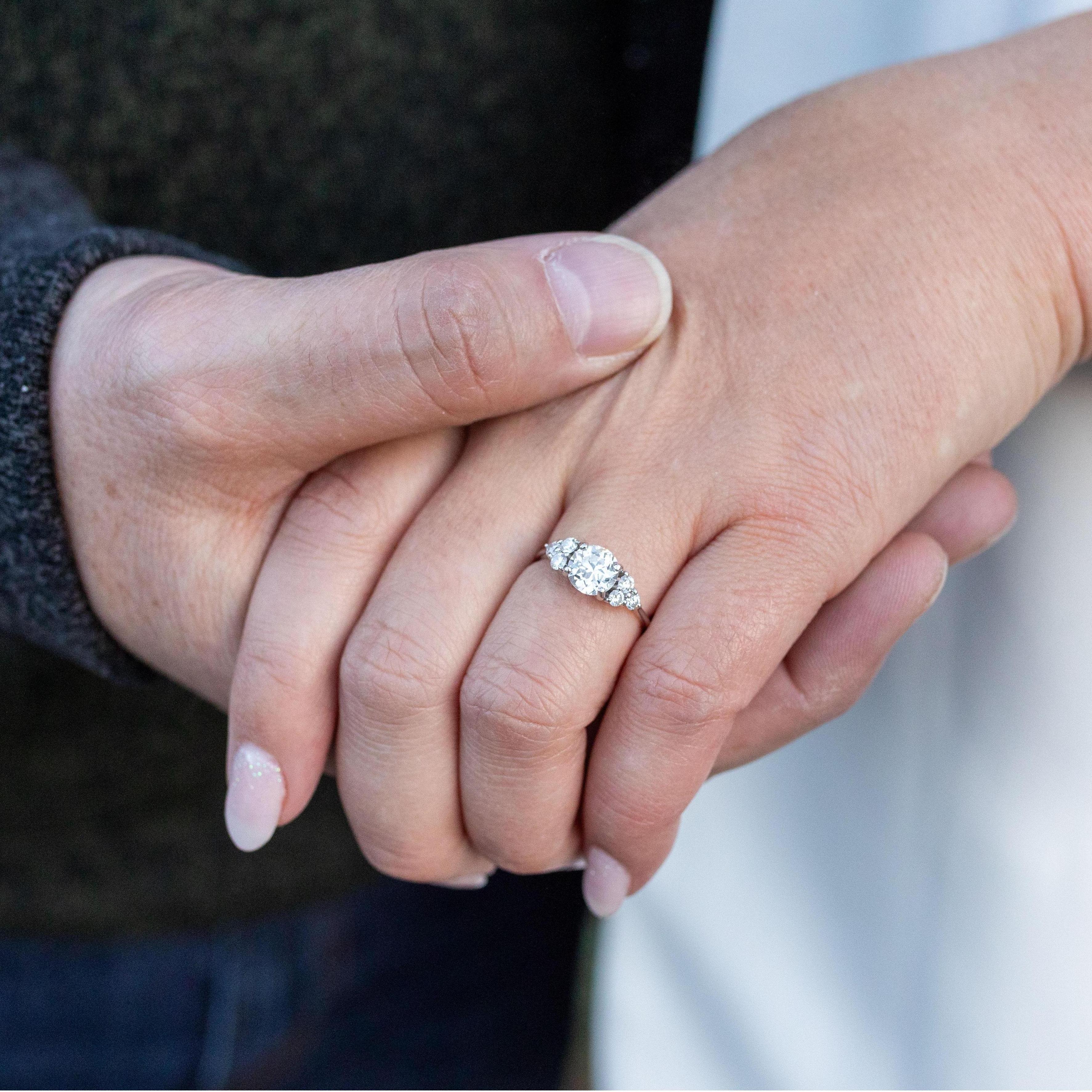 Our engagement ring features a family stone and was a custom design. Meg loves it so much!