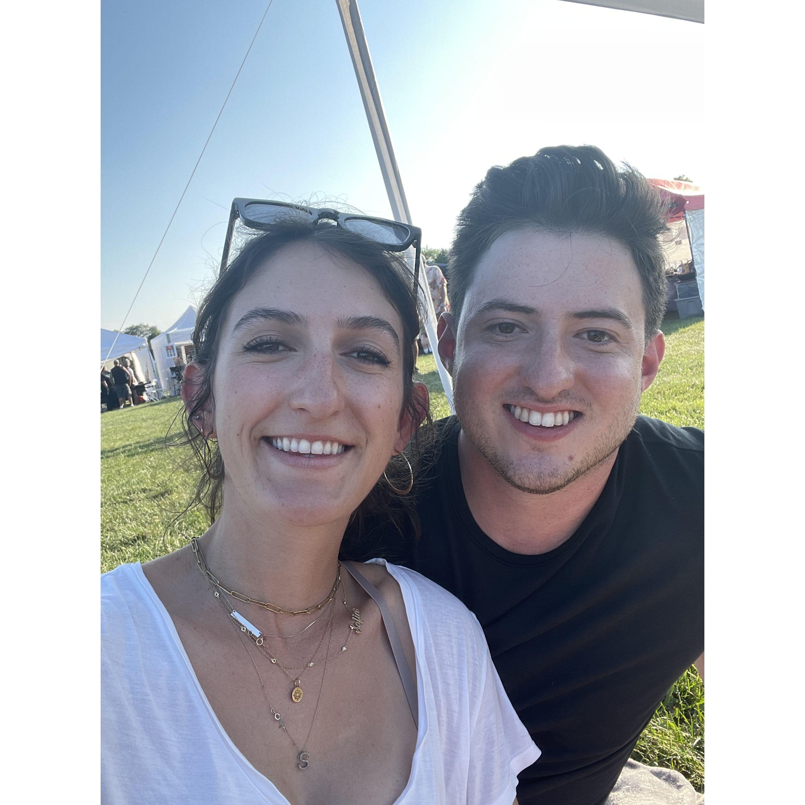 This is our first picture together! It was at a small festival in a park in Chicago!