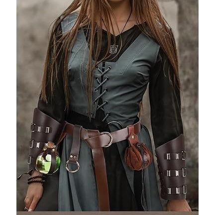 Royalty! Dress base, vest or corset, vambrace, belt, accessories, braided hair, (You are aloud to wear pants!) You clearly bought some extra stuff just to be extra... and we love it!