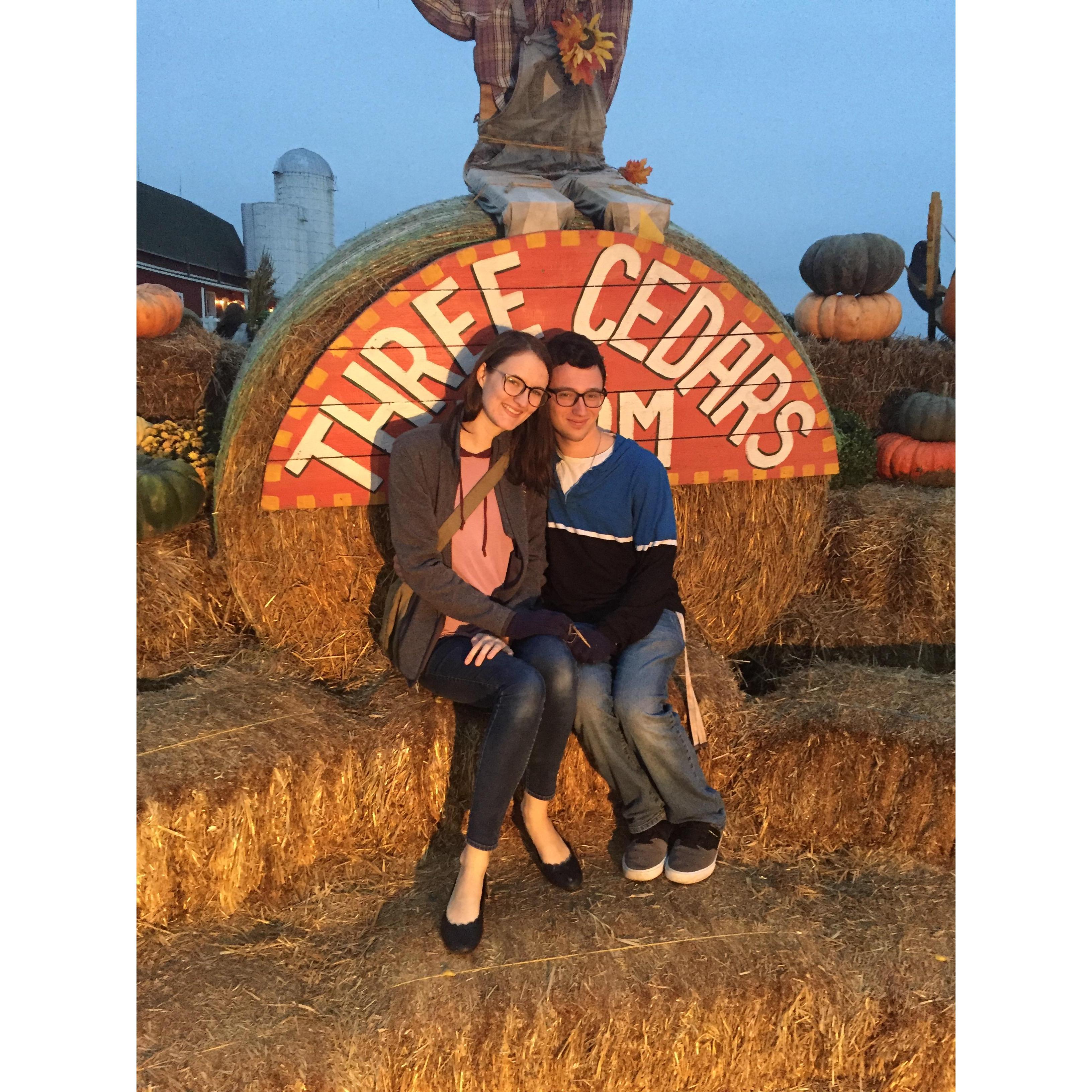 A picture at our favorite cider mill and pumpkin patch! The best cinnamon-sugar donuts you can get!