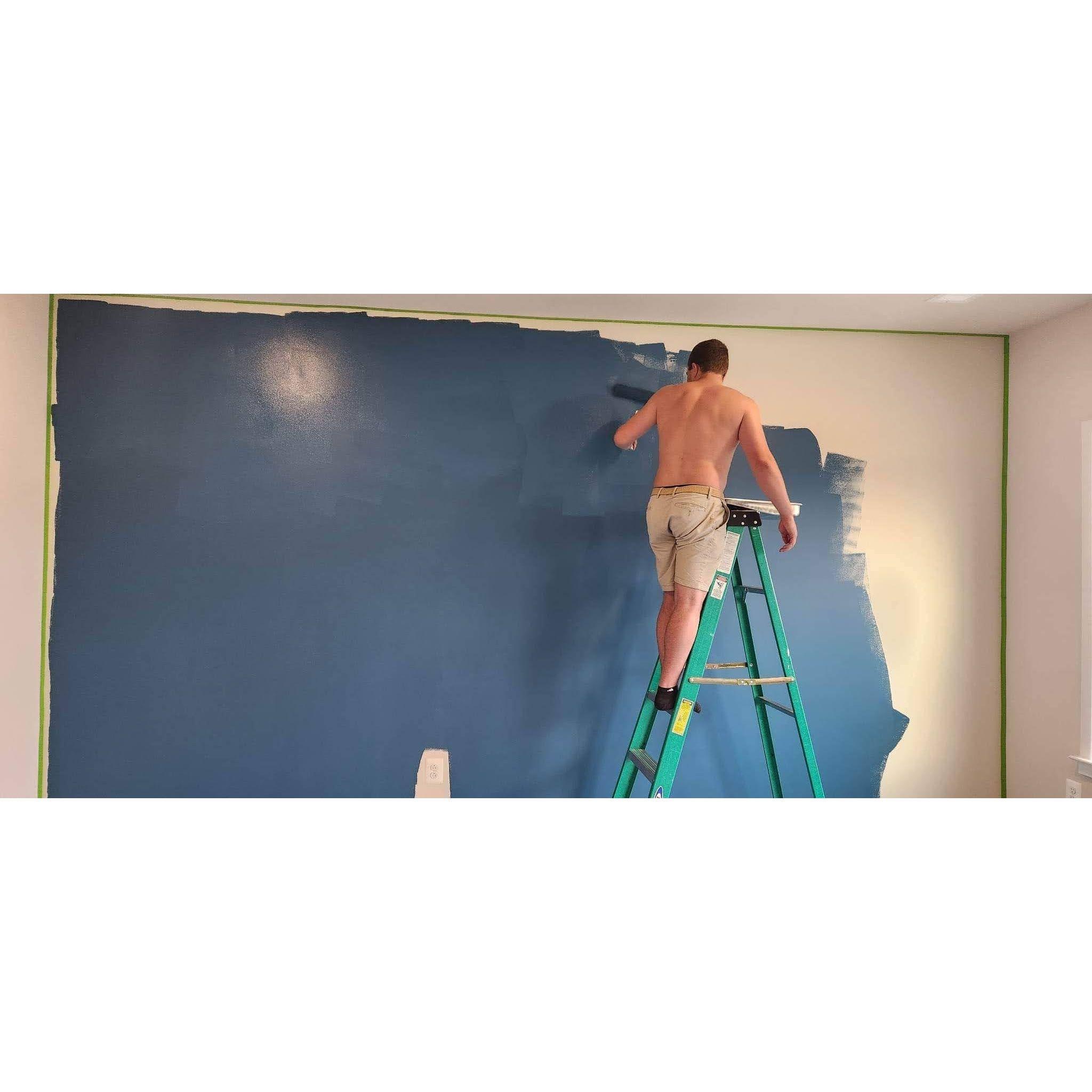 Ryan painting our new house