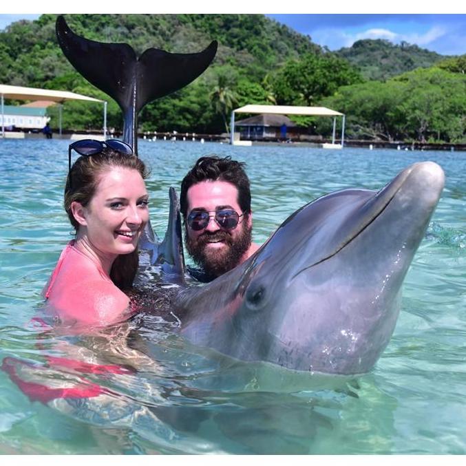 Playing with dolphins in Roatan