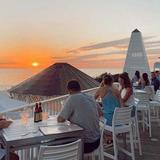 Enjoy sunset drinks at Bud & Alley’s rooftop bar