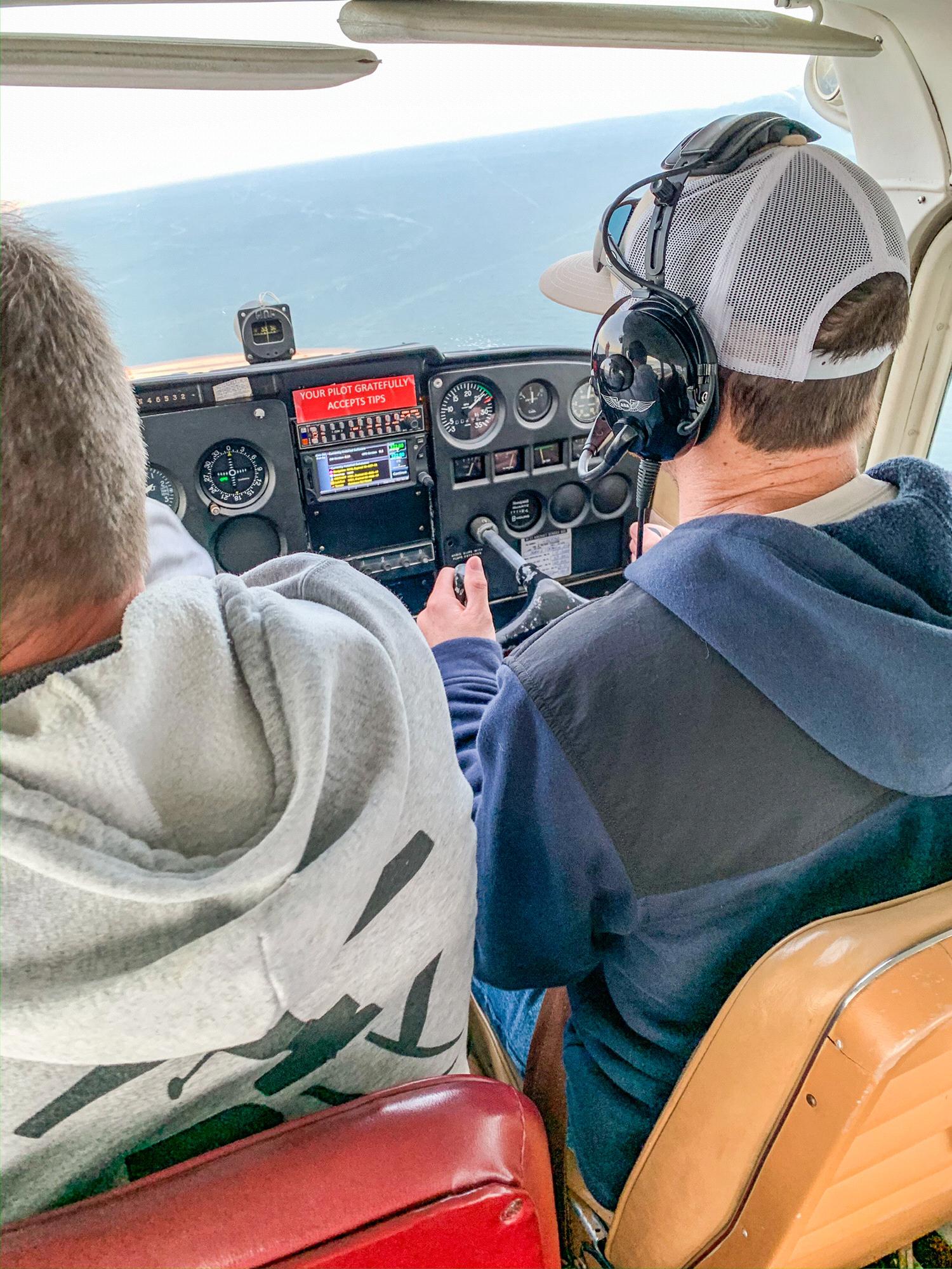 Tucker really wanted to go on an airplane ride! It was so much fun! He even got to be copilot and fly the plane.