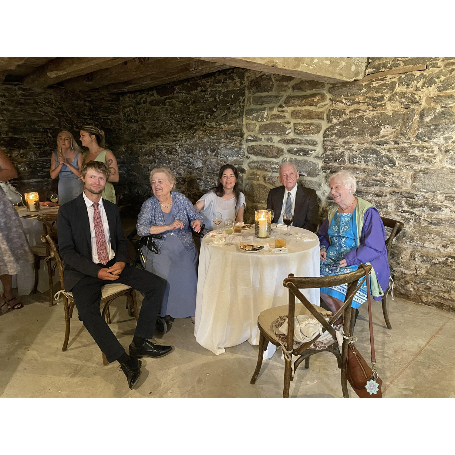 With Amanda's grandparents at her cousin wedding, May 2024.