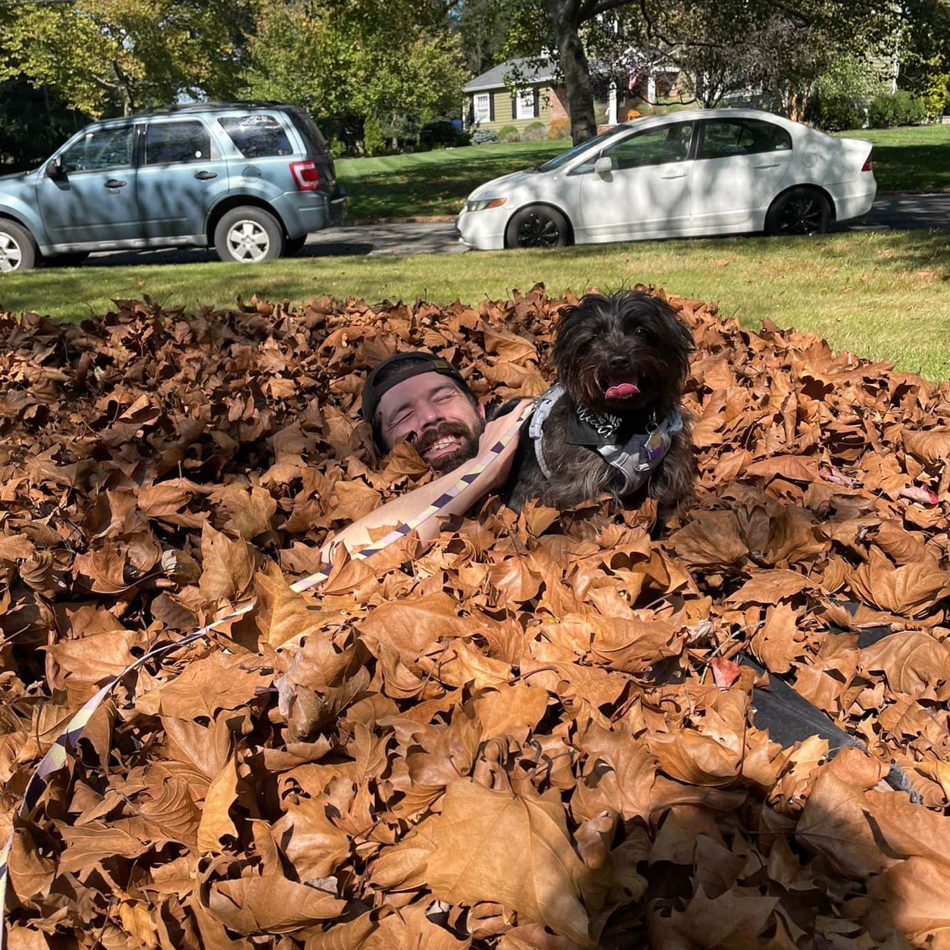 Kyla's first big girl leaf pile with her daddy!