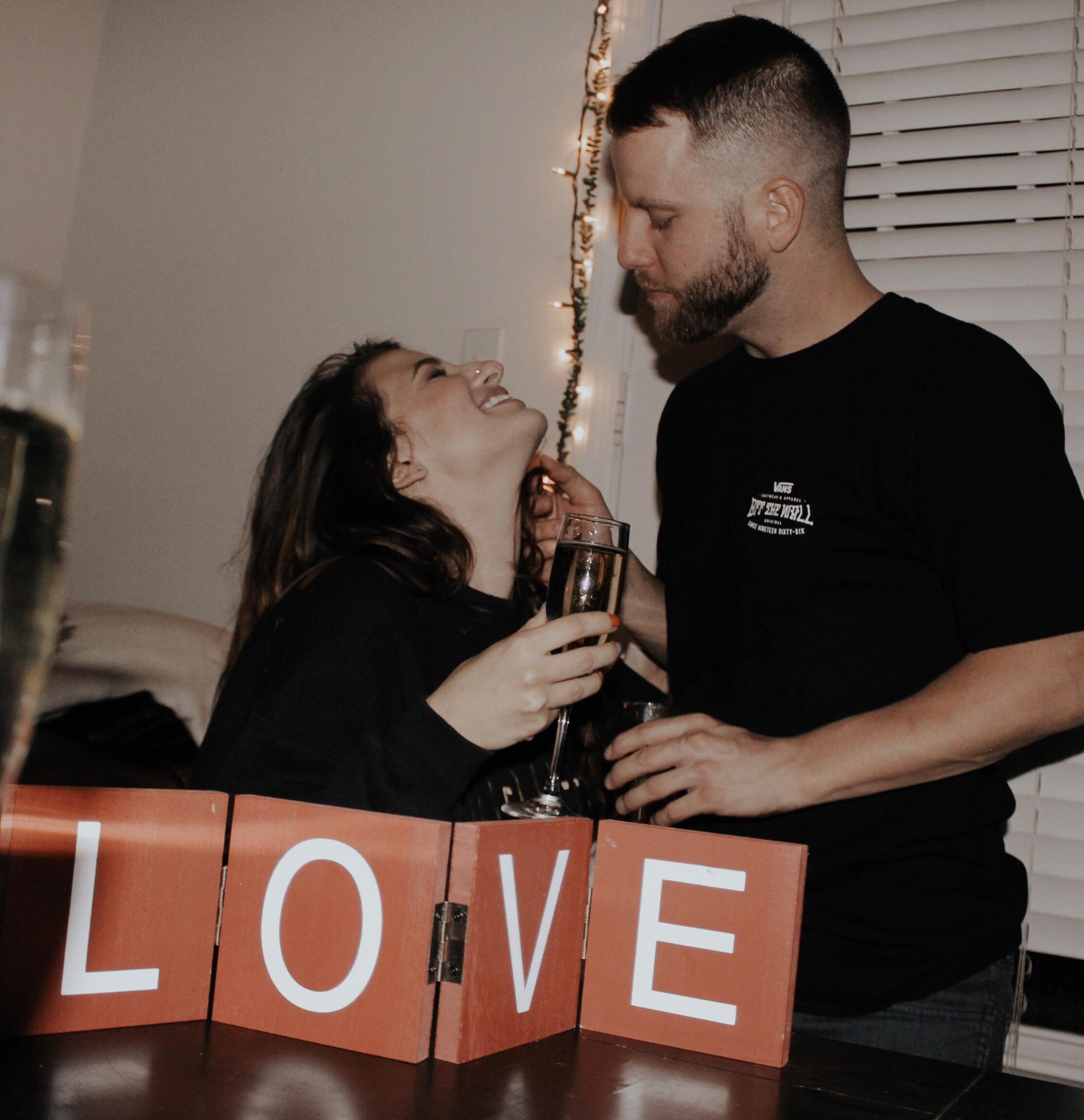 My Maid of Honor, Katie, snapped this picture of us celebrating the week we got engaged.