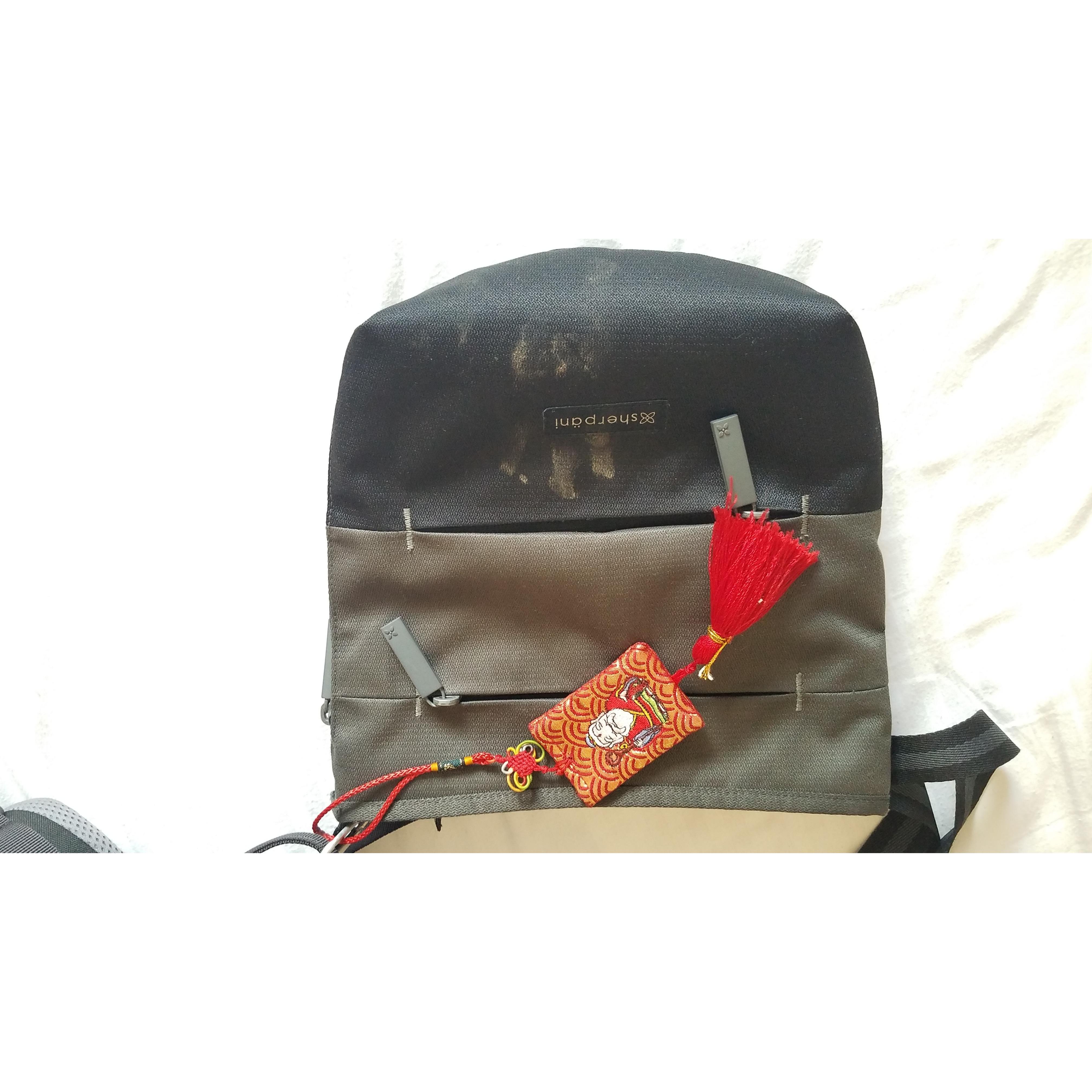The "Old Lucky Bag" and Kates purse with monkey-attack marks