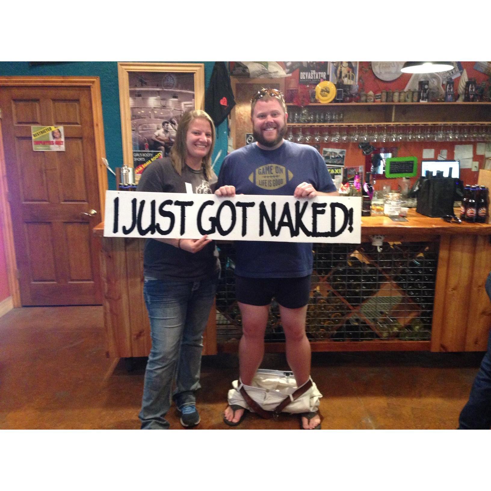 At Naked Winery outside of Rapid CIty, you get the sign after you buy some wine... and Alex took it one step further