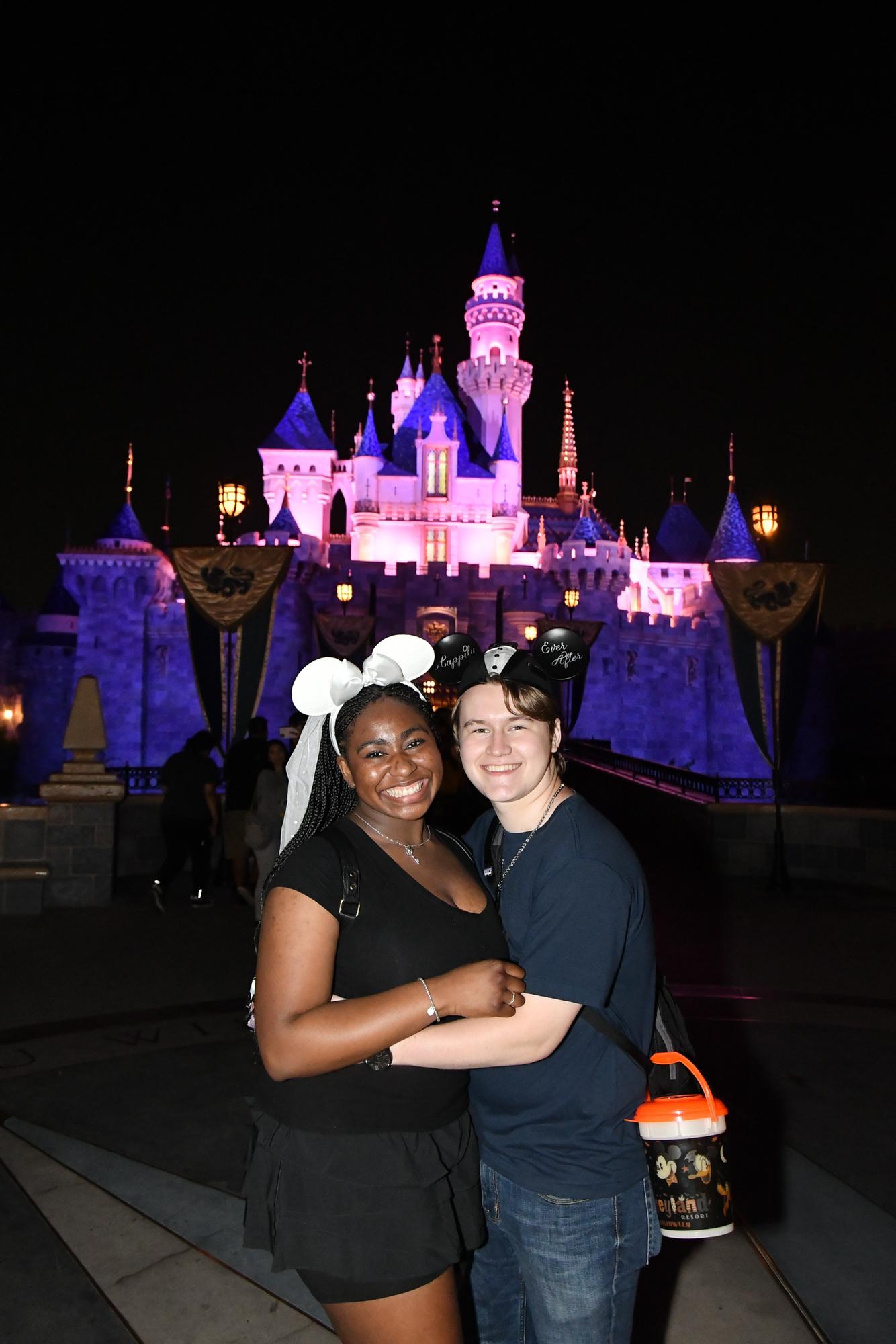 A Disney cast member took this picture of us in front of the castle! The flash was blinding but we were too blissful to care!