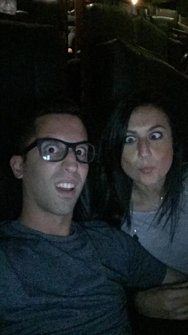 Dating less than 1 month. Acting silly before the movie started.