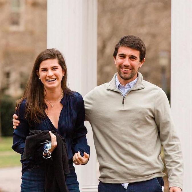 Mark proposing in front of the UNC Old Well (2021)