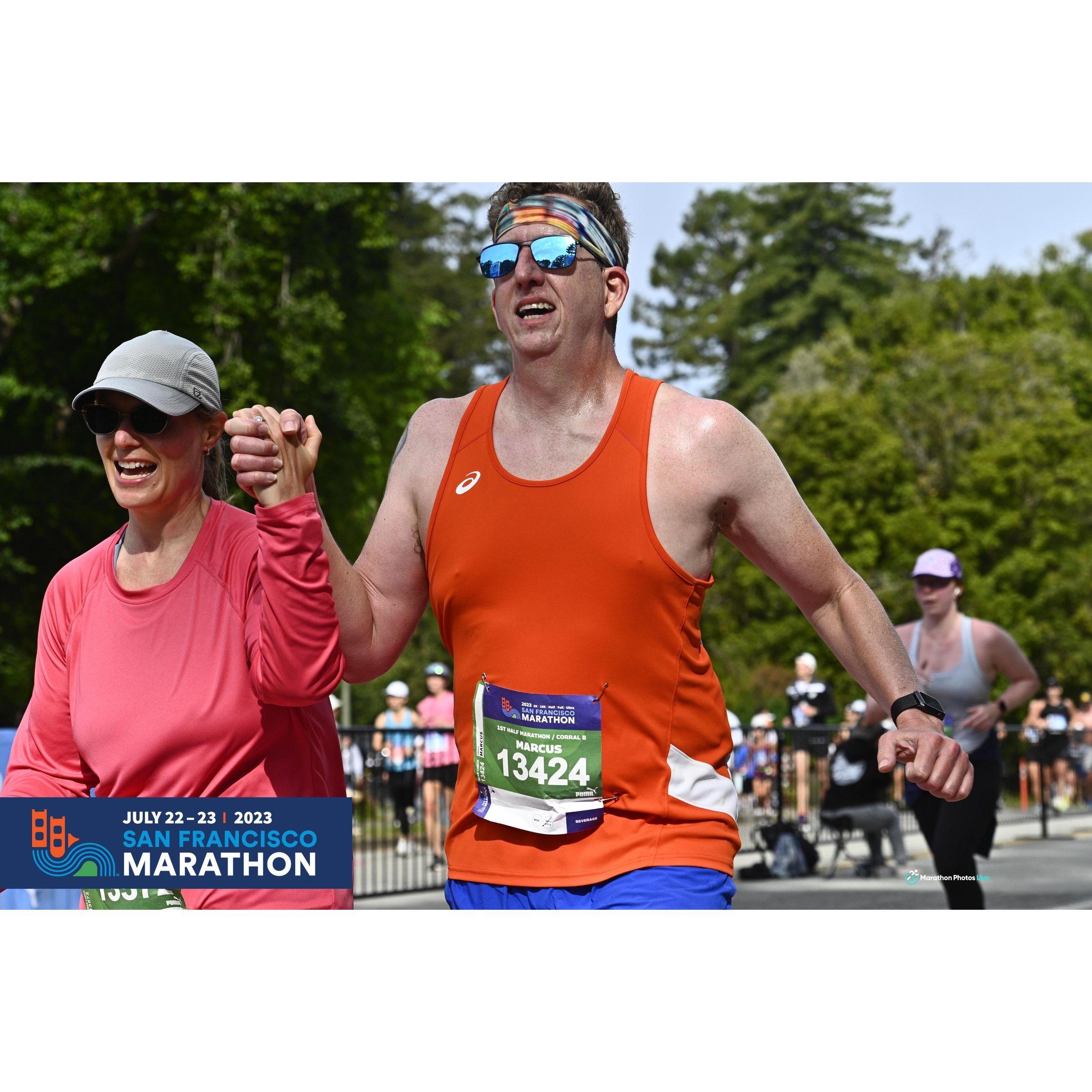 Crossing the finish line of the San Francisco Half Marathon together in July 2023