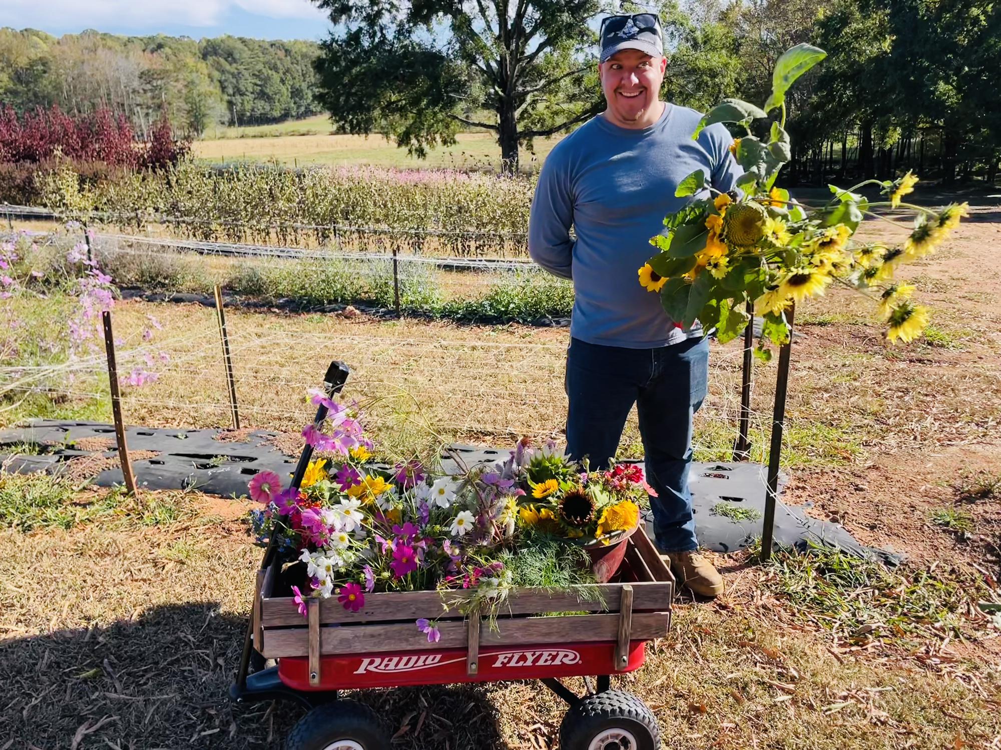 Back at the flower shack! Davis is the best flower holder ever!!!