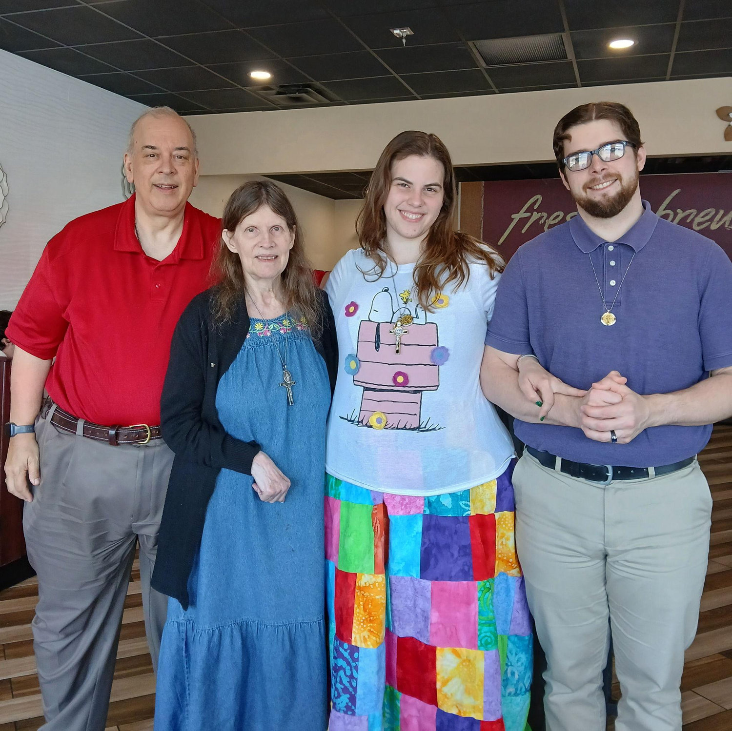 Odie came with Marie's parents to her graduation!