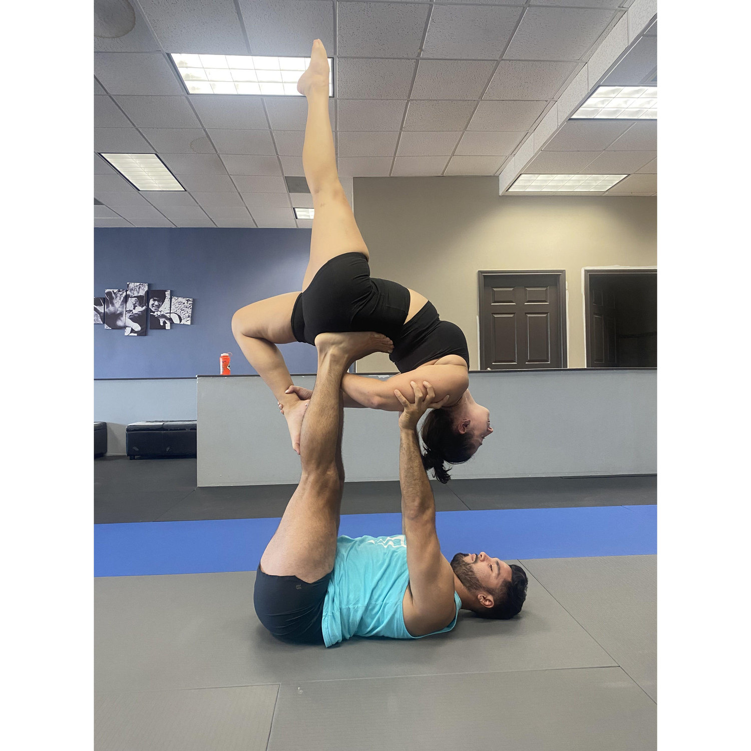 Always trying something adventurous, this time in a couple's acroyoga class.