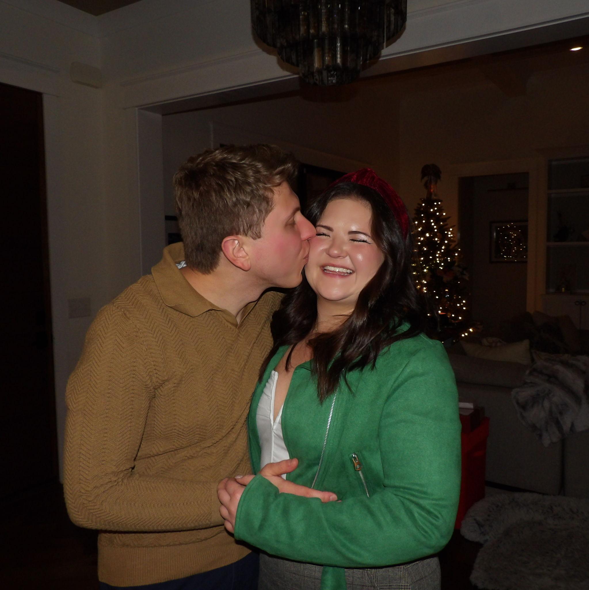 A little kiss under the mistletoe