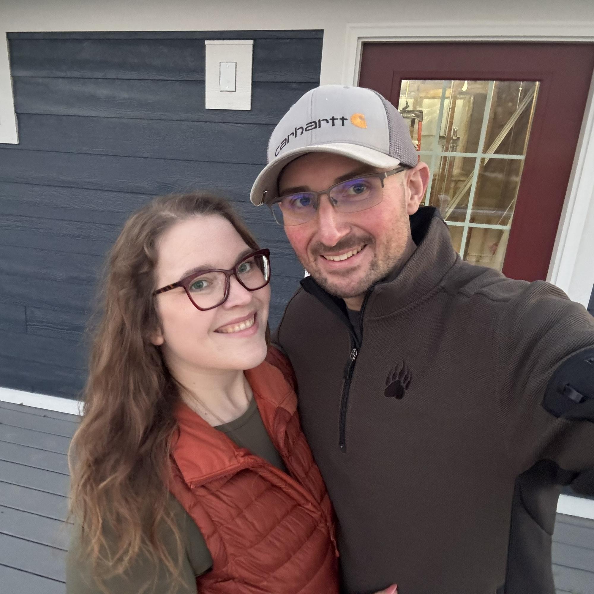 In front of our new front door!