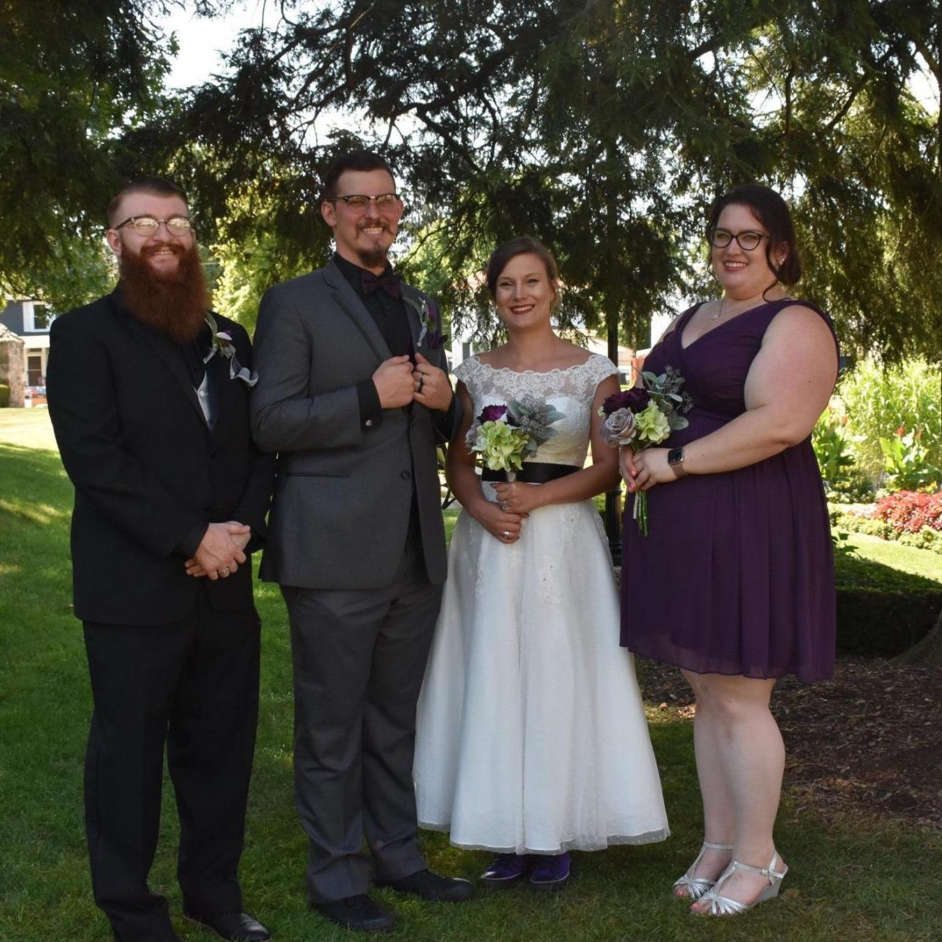 With Caitlin's brother and sister in law at their wedding in August 2019.