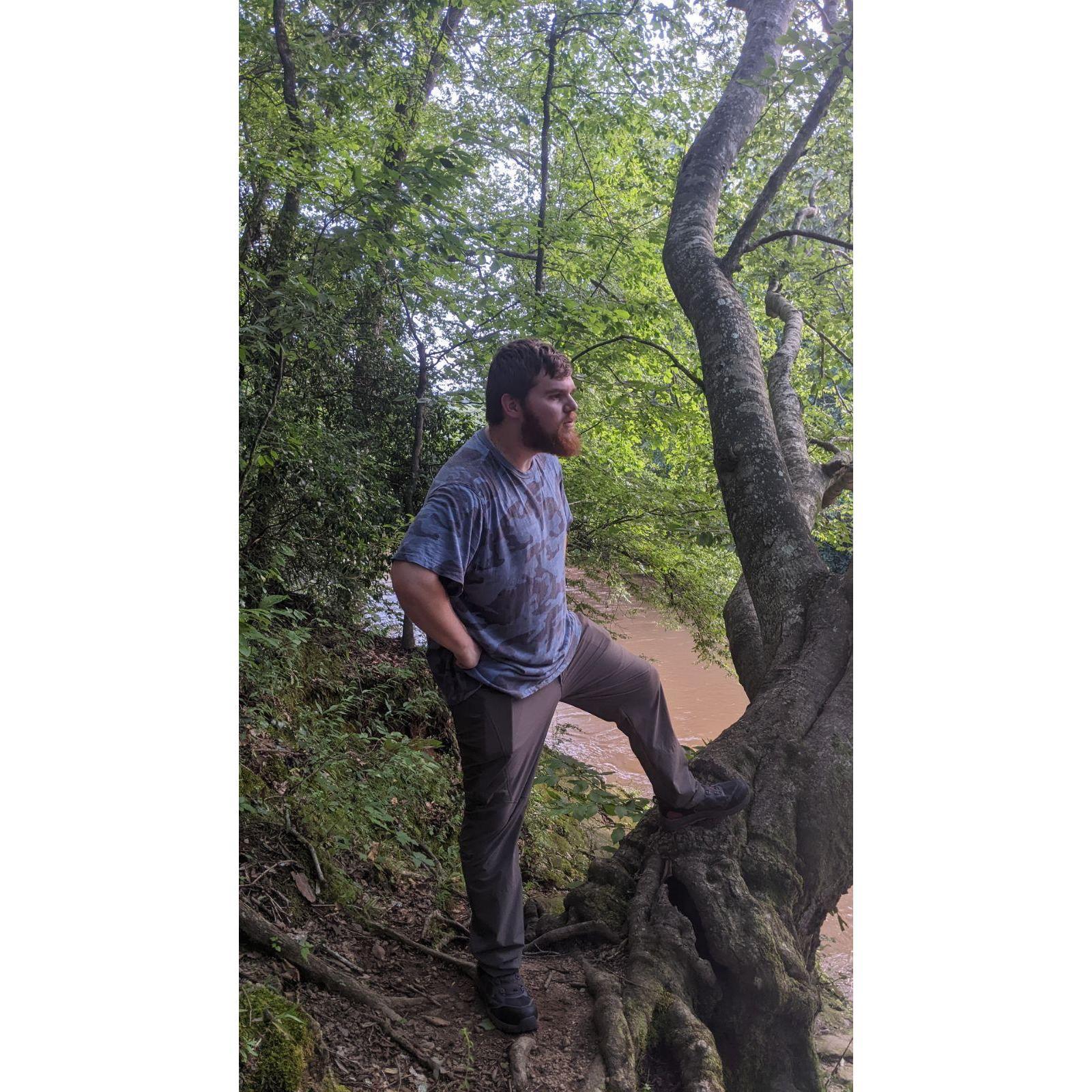 We were modeling by that tree and this is Nathaniel's face when he spotted a baby doll in the river that we mistakened for a real baby.