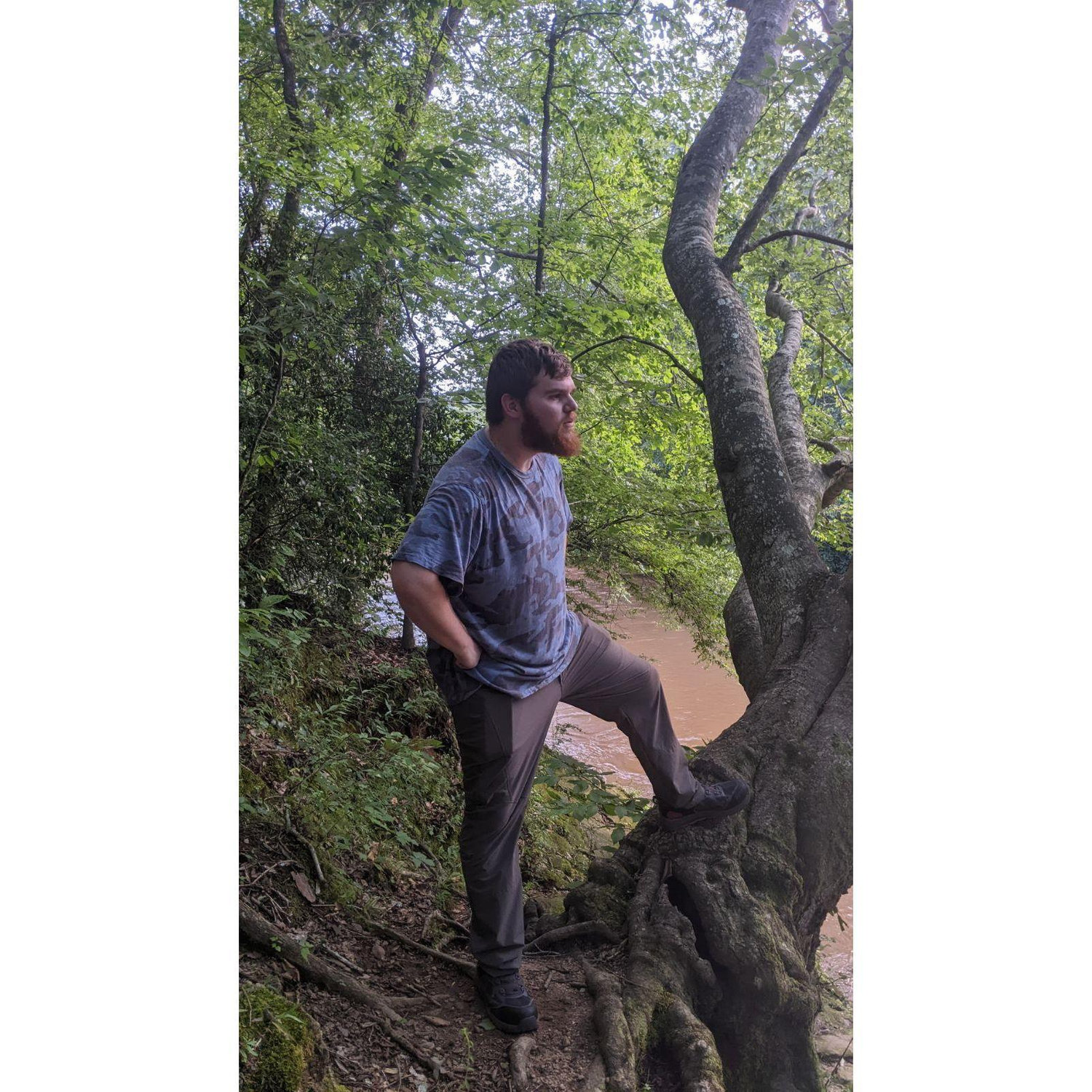 We were modeling by that tree and this is Nathaniel's face when he spotted a baby doll in the river that we mistakened for a real baby.