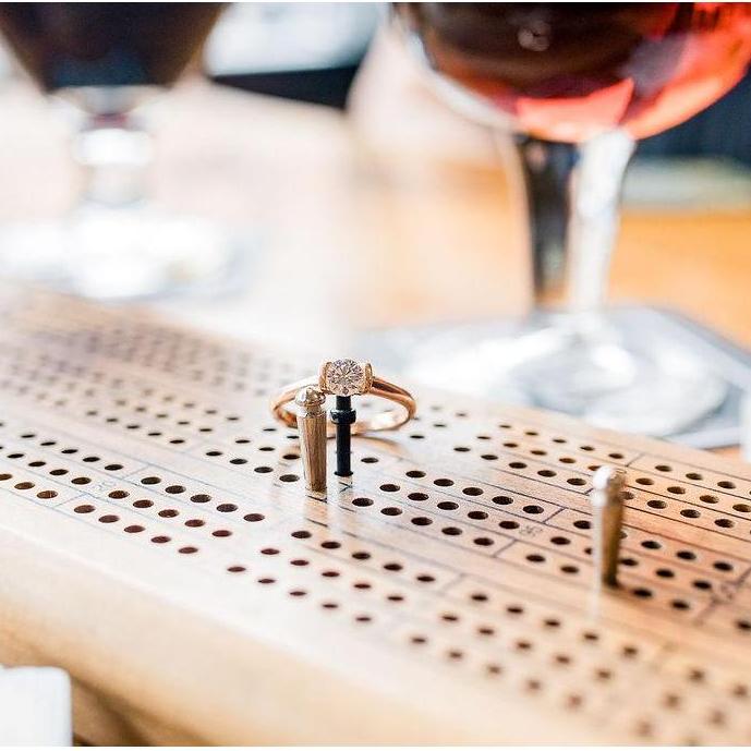 The ring. 
When we lived in Torrington, we spent a lot of time going over to Laramie and enjoying brews at this brewery. Over the years, Alana's cribbage skills have improved drastically.