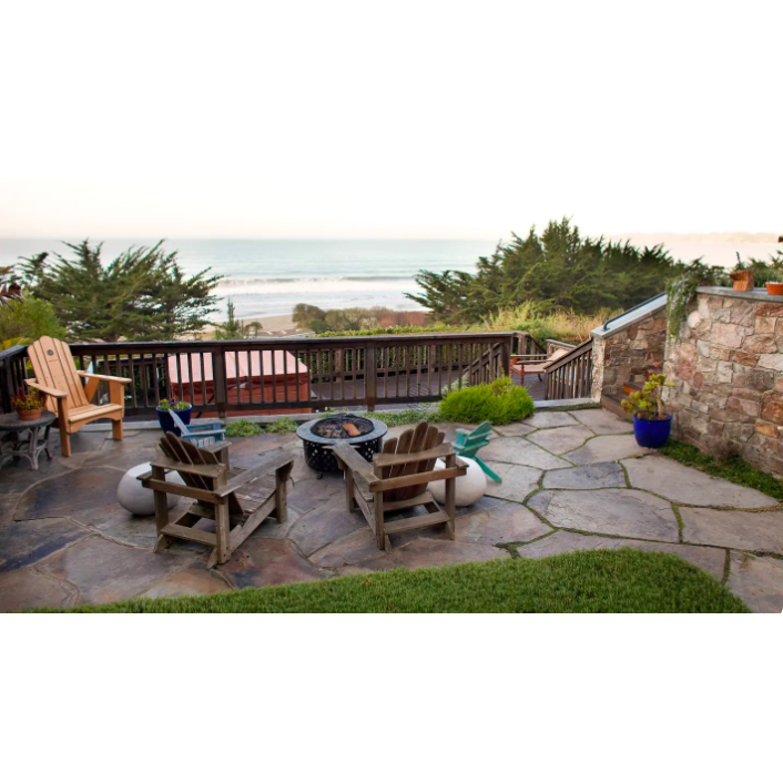 Willow Camp patios: the entire estate is filled with serene spaces to take in the ocean views. Bring a book to read by the fire or catch up with some new friends