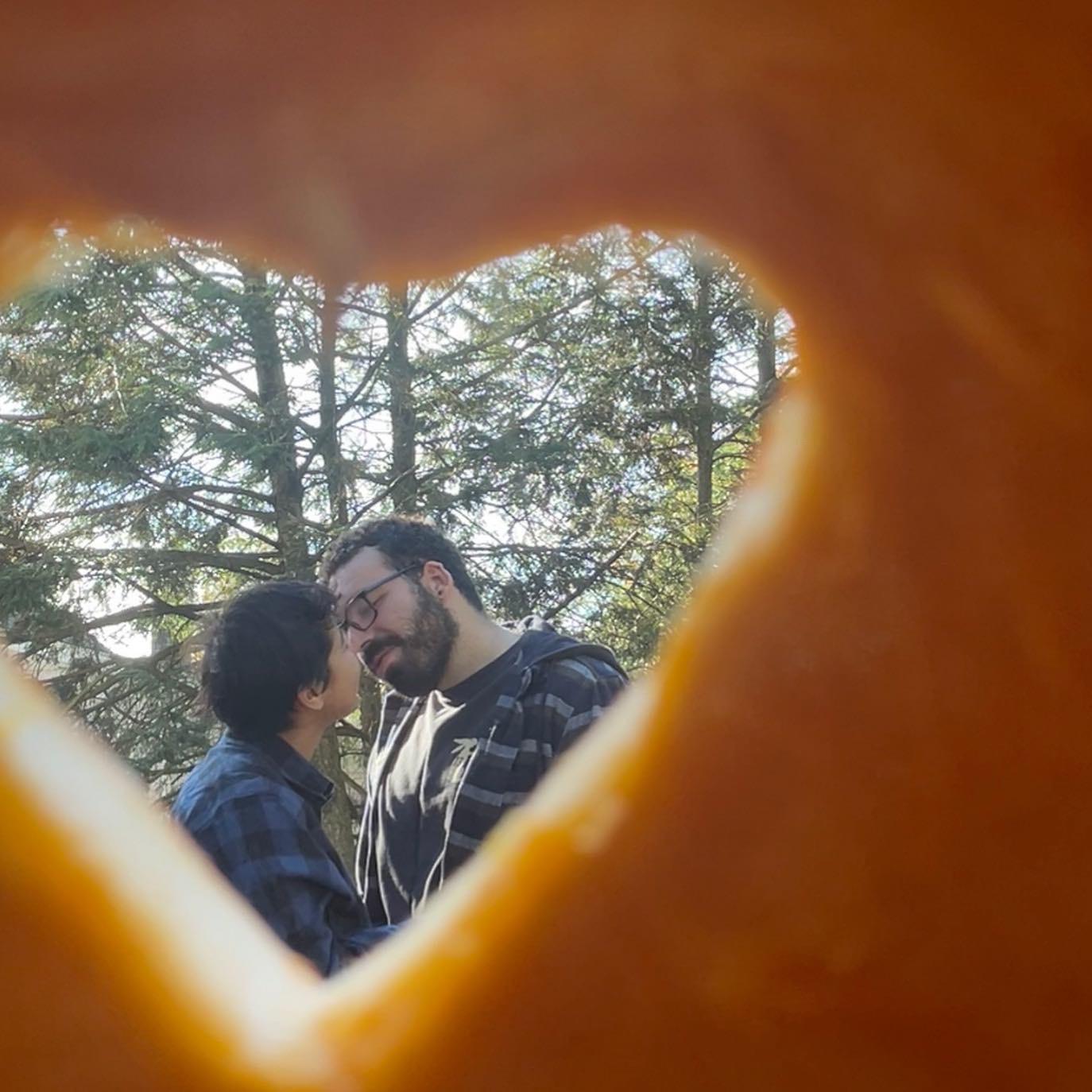 Pumpkin carving kiss break